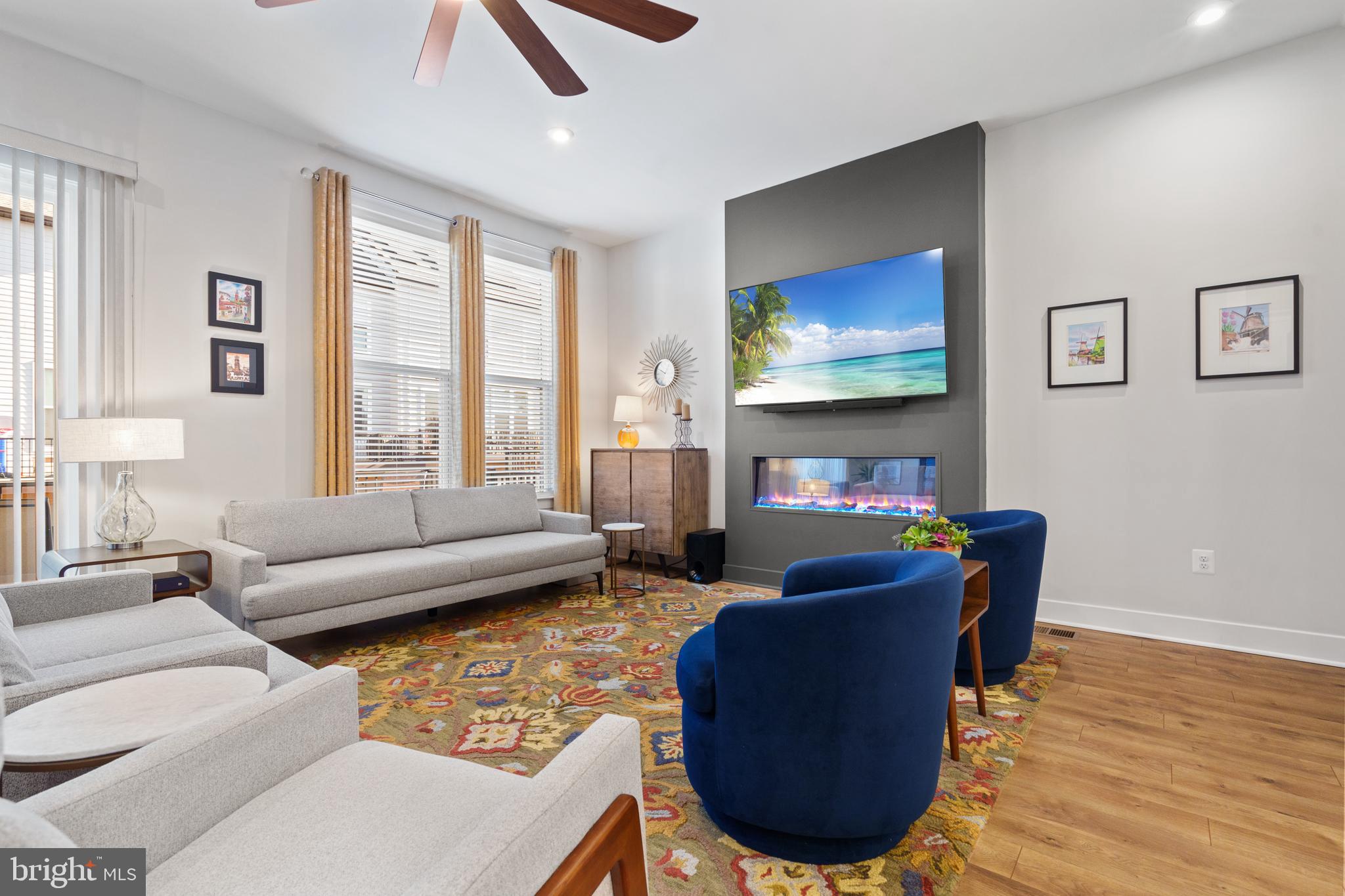 ***WHY WAIT ON NEW CONSTRUCTION AND PAY NEW CONSTRUCTION PRICES***...when you can move into this lightly lived in  2022 build with over $100,000 in upgrades! Conveniently located within walking distance to Innovation METRO, minutes to Toll Rd., and Rt 28. Just one stop to Dulles on the Silver Line! Sunny delight facing due south with natural light all day.  Entry level  bedroom/office and full bath. Main level features a half bath,  LVP throughout, and 10' ceilings. Gourmet kitchen with 40" cabinetry, subway tile backsplash, upgraded GE stainless appliance package, double ovens,  electric cooktop, and massive quartz island. Living room features  custom window treatments, electric fireplace, and sliding door that opens to expansive TREX deck perfect for grilling, entertaining and watching the sunset. Separate formal dining room. Upstairs a spacious primary bedroom with walk-in closet and gorgeous en-suite primary bath with dual vanity. Two secondary bedrooms, hall bath, and laundry also on this level. We saved the best for last....fully finished loft with full bath offers a dynamic space for home gym, 5th bedroom or office space, separate large storage  and the 4th FULL BATH.  Opens to sunny rooftop deck! A full list of builder upgrades is found in the mls docs section. YOU'LL LOVE LIVING HERE!!