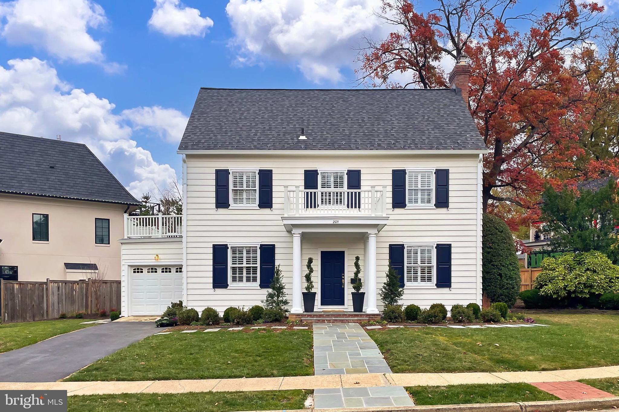 SUNDAY 1/26 /2025 - 1-3  OPEN HOUSE IS  CANCELLED.   A Perfect Blend of Charm, Space, and Location
Nestled in the heart of Lyon Village, one of Arlington's most desirable neighborhoods, this beautifully situated Center Hall Colonial offers the perfect combination of classic elegance and modern updates. Set on a generous 7,000 sq. ft. corner lot, this home is ideally located amidst tree-lined streets, creating a peaceful retreat while still being close to everything you need.
A Warm Welcome: As you approach the home, a newly added front portico sets the tone for what awaits inside. The gracious entrance, complete with dual coat closets, opens to a spacious foyer with direct views of the lush rear garden. With its expansive layout and natural light, the home feels inviting from the moment you step through the front door. A True Center Hall Design: The home's classic center hall design features a formal living room with a beautiful marble fireplace, offering an ideal space for both casual and formal gatherings. Adjacent, the large dining room provides ample room for hosting family meals or dinner parties, comfortably seating up to 10 guests. This home is built for both everyday living and making memories during special occasions.
A Dreamy Kitchen: The heart of this home is the newly updated galley kitchen. Featuring white shaker cabinetry, high-end gourmet appliances, and luxurious quartz countertops, this kitchen provides a sleek and functional space for preparing meals. The charming eat-in niche adds a cozy touch, perfect for morning coffee or a quick bite. Whether cooking for the family or entertaining guests, this kitchen has it all.
Lifestyle-Friendly Living: The spacious family room, located just off the kitchen, offers a serene spot to relax and unwind. With floor-to-ceiling windows overlooking the rear garden, this room brings the outdoors in, creating a seamless flow between the home’s interior and its beautifully landscaped outdoor spaces. Whether enjoying a quiet evening or hosting family and friends, this space is perfect for gathering and connecting. A Retreat Upstairs: Upstairs, the large primary bedroom is a true retreat, complete with a walk-in cedar closet and a fully updated ensuite bath. In addition, enjoy access to a private roof terrace—perfect for watching the sunset or enjoying a quiet moment at the end of the day. Two generously sized secondary bedrooms and a newly redone hall bath complete this level, offering plenty of space for family or guests.
Versatile Lower Level: The fully finished lower level offers a recreation room that can easily be transformed into a guest suite or playroom. Additionally, the recently renovated lower-level bath, complete with a large shower, is perfect for refreshing after a workout or a day outdoors. For added convenience, the lower level includes a large laundry area with a full-size washer and dryer, as well as ample storage space that could easily be converted into a home gym. Outdoor Living: The outdoor spaces of this home are as impressive as the interior. Professional landscaping surrounds the rear yard, with lush plantings, flagstone paths, and a cozy fire pit area, creating a private oasis for relaxation and entertainment.  Exceptional Location: Beyond the home’s exceptional features, its location is a highlight. Just blocks away, you’ll find the Lyon Village Playground and Park, which includes a playground, tennis courts, and basketball courts—ideal for outdoor activities. Clarendon Crossing, known for its vibrant dining, shopping, and cultural scene, is a short walk away, with Whole Foods, Crate and Barrel, William Sonoma, and a variety of restaurants and shops at your fingertips.For commuters, the location couldn’t be more convenient. This property not only offers incredible living space but also the potential for expansion. Plans for future expansion will be provided to next owner should you wish to add additional square.