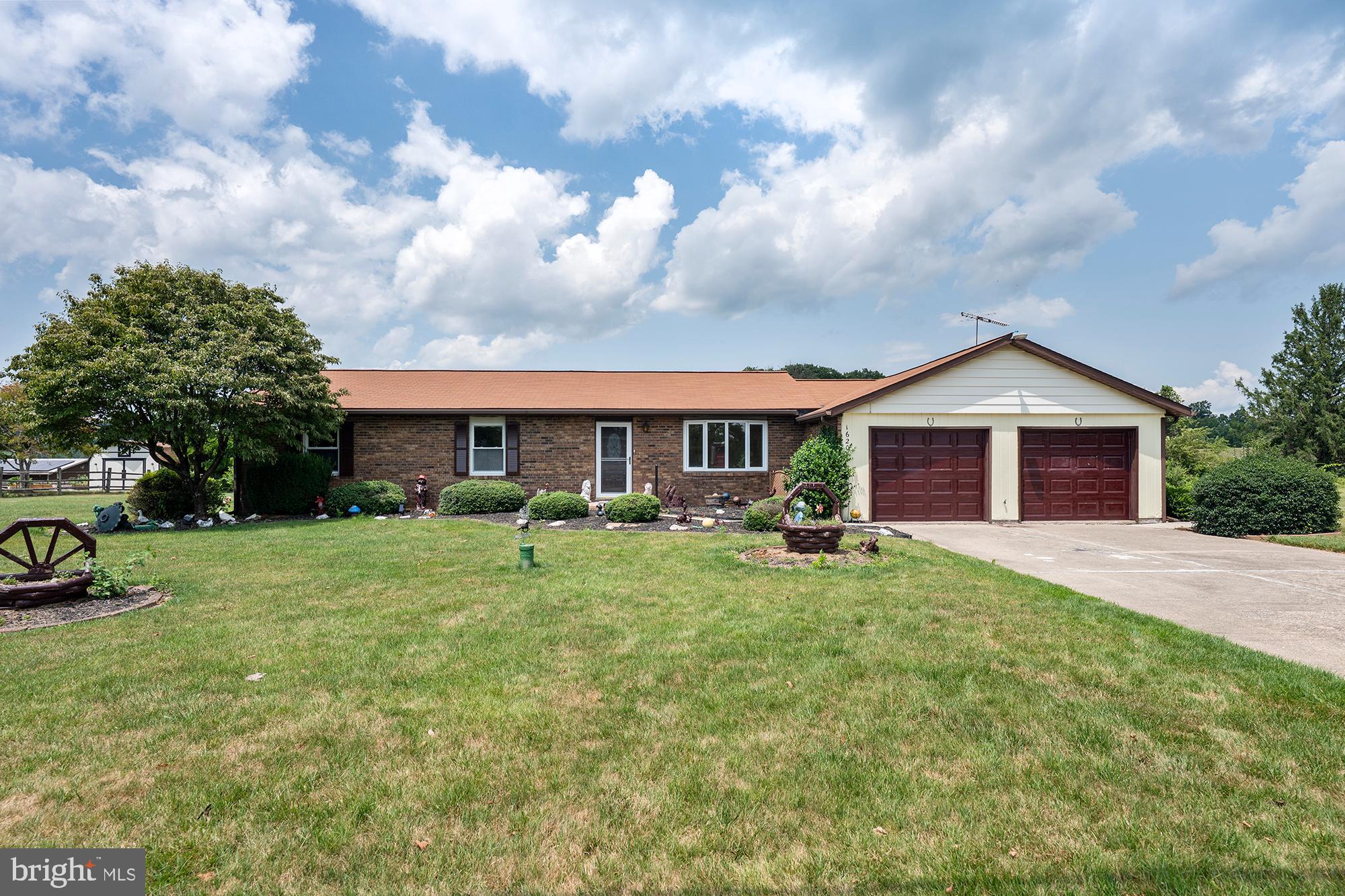 Open Houses THIS weekend: Saturday (7/25) from 11AM-1PM AND Sunday (7/26) from 12-2PM!! With stunning farm views and just minutes from downtown Westminster, this 3BR/2BA rancher is full of potential and waiting for your vision. Inside, the home offers a spacious layout with a bright front living room featuring a large bay window, an eat-in kitchen with abundant cabinetry and newer appliances, and an adjoining dining area that opens to the enclosed rear porch. Just beyond, the expansive family room with wood-beamed ceilings, a cozy fireplace, and sliding doors to the deck creates the perfect gathering space while overlooking the peaceful rural setting. The primary bedroom includes an en suite full bath with walk-in shower, while two additional bedrooms and a second full bath complete the main level. An attached two-car garage offers plenty of storage with built-in shelving. Lovingly maintained over the years with newer roof (2017), water heater (2020), and heat pump (2016), this home is ready for its next chapter. Whether you're looking to make cosmetic updates or transform the space into your dream home, the setting, layout, and location provide the perfect foundation to make it your own. Sold as is.