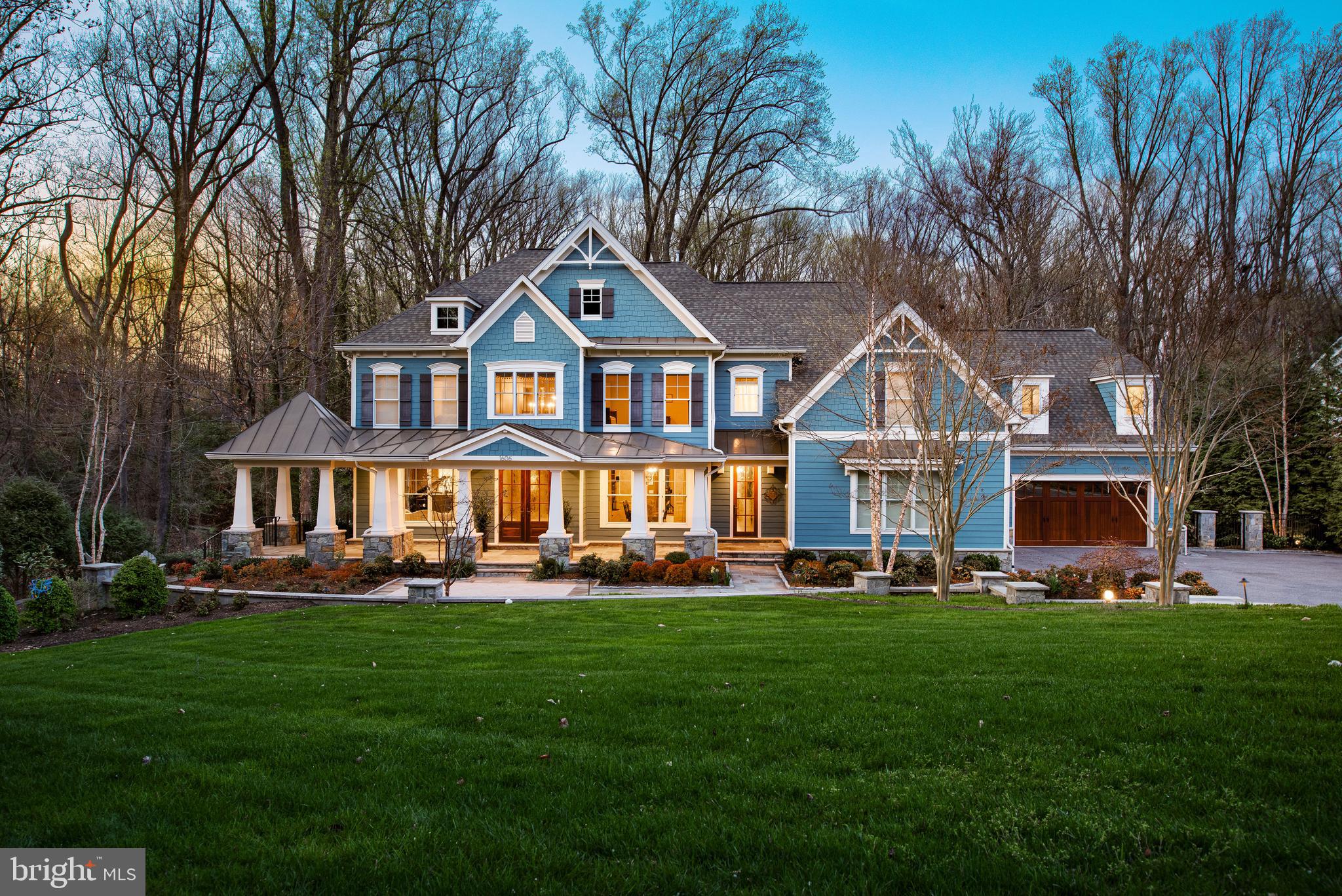 Custom estate on almost 3 wooded acres. Enter thru gorgeous custom double wood & glass front doors into a two-story foyer with stunning curved staircase with wrought iron banister & stair rails. Formal Living & Dining room feature tiger wood flooring, custom moldings & draperies. Study with custom moldings, built-in shelving, roman shades & drapes.  Incredible kitchen was a complete remodel to include all new cabinets & custom layout. Granite counter tops, oil rubbed bronze & nickel hardware, custom tile back splash, pot filler, Wolf 6-burner gas range & second oven, Wolf induction 2-burner cooktop & two Asko dishwashers. Incredible island with custom pendant lights & seating for 2. Subzero 30" refrigerator & separate 30  freezer. Built-in Miele coffeemaker. Breakfast nook ]in  kitchen with plenty of informal dining space. Walk-in pantry & custom wet bar with Subzero beverage refrigerator & ice maker. Great room features floor to ceiling windows overlooking forested acreage & ravine, custom drapes, and 4 commissioned paintings. Craft room features powder room & custom Elfa storage system & a second mudroom. Master Bedroom with double-sided gas fireplace & separate sitting room features dry bar with granite counter tops & beverage refrigerator. Impeccable bath features separate walk-in shower with rain nozzle & multiple shower heads, soaking tub with custom tile work, dual custom vanities with granite tops & heated flooring. Incredible master walk-in closet with custom cabinetry, custom shoe storage & large island with storage galore. Three upstairs guest rooms include one en suite bedroom with huge walk-in closet & updated bath, & two that each have walk-in closets & a shared bath that was completely renovated. Upper level laundry with granite counter tops & custom cabinetry. Lower level features  Media Room with pool table and shuffleboard table. Additional space in the lower level includes double desk area with custom cabinetry & a ping pong/air hockey table. Guest bedroom features full bath plus double doors to outdoor patio. Exercise room with home gym equipment conveys.  Custom bar with granite counter tops, cork flooring & 30" Subzero glass door refrigerator & freezer drawer. Incredible 800+ bottle custom wine cellar with Wine Guardian cooling system. Owners added pool house in basement including a kitchen with GE Monogram refrigerator & microwave, Bosch dishwasher, & Wolf induction cooktop, granite counter tops & custom cabinets. Pool house features private bath with custom cabinetry, custom tile work in shower & vanity. Convenient lower level laundry with custom cabinets was also added. Lutron shades, lamp, fan, & light controls, in-ceiling speakers & in-wall audio controls throughout the home. Owners expanded garage to include 4th bay. Au pair suite above garage includes bedroom, full bath, walk-in closet & family room area, with separate staircase access. Exterior provides the perfect spot for entertaining. Screened in porch with retractable window panels & IPE composite wood flooring. Upper level deck with IPE composite flooring & Viking gas grill. Extensive hard scaping including covered patio off Media room & abundant landscape lighting. Outdoor kitchen with Kalamazoo appliances & gas grill. 36' heated Infinity edge pool with PebbleTec coating & tile accents, &  8-person spa with spillover feature, adjacent to fireplace patio with water feature. Additional features include 3 tankless water heaters, whole house generator & 11 zone irrigation system. All televisions convey along & state-of-the-art AV system lets you play any video source on any tv & any audio on any speaker zone in & out of the home. See docs for inclusions & explanation of AV system. Interactive floorplan https://mls.truplace.com/property/235/85589/ . Matterport tour at https://my.matterport.com/show/?m=a2b5RQZahWj