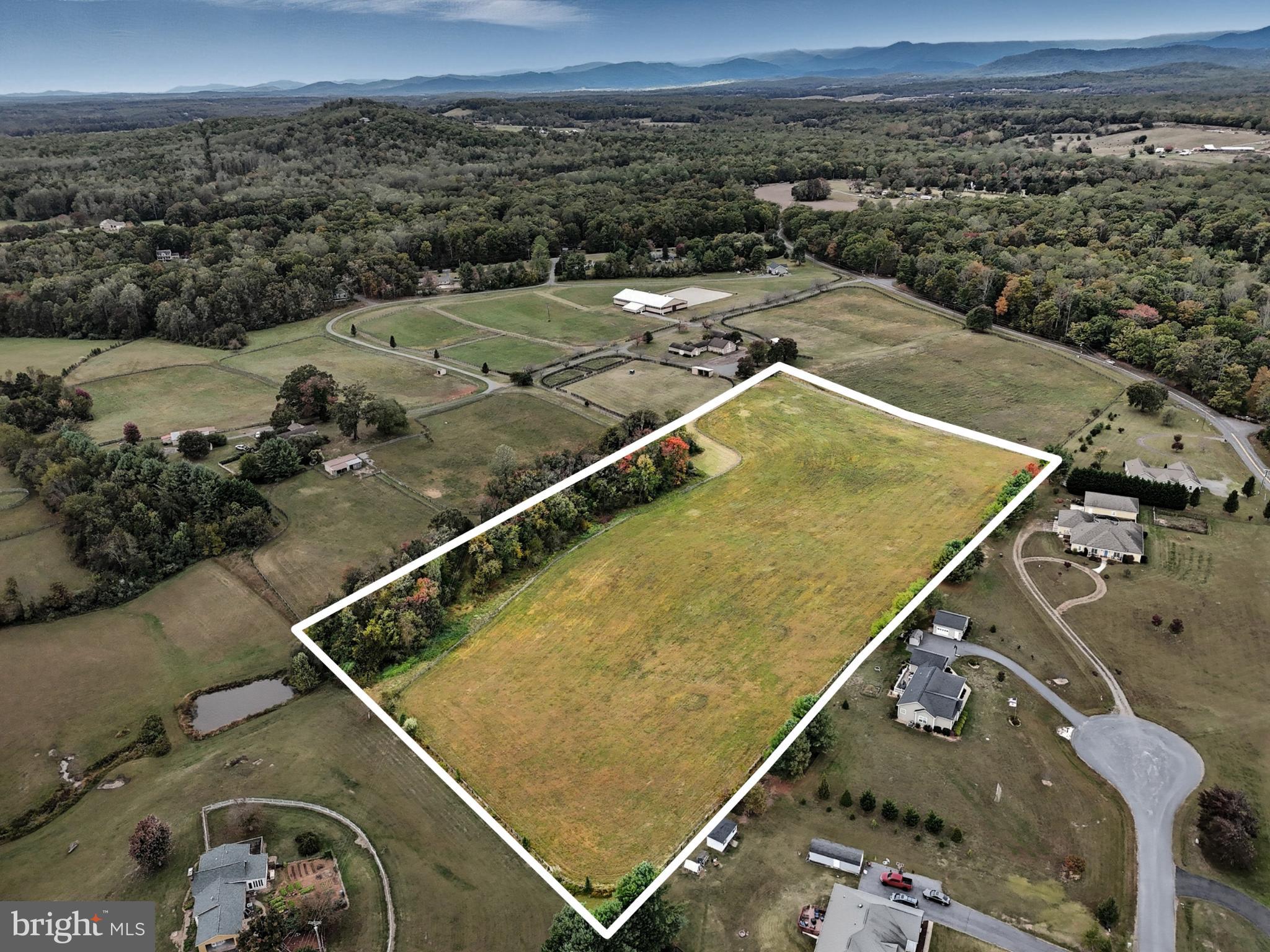 Exceptional Opportunity! Gorgeous 10+ acre Estate Lot Minutes from Culpeper and Miles Away from Ordinary.  Lot is cleared and offers tremendous views of ponds on neighboring property or horses at the adjacent equestrian facility (also currently for sale).  Property can be viewed by taking Olympic Way and turning left just past stables. Property will eventually be serviced by a shared 50' ROW called Yearling Way.  4 Bedroom Conventional Perc Study on Hand. Survey in Docs Section.
