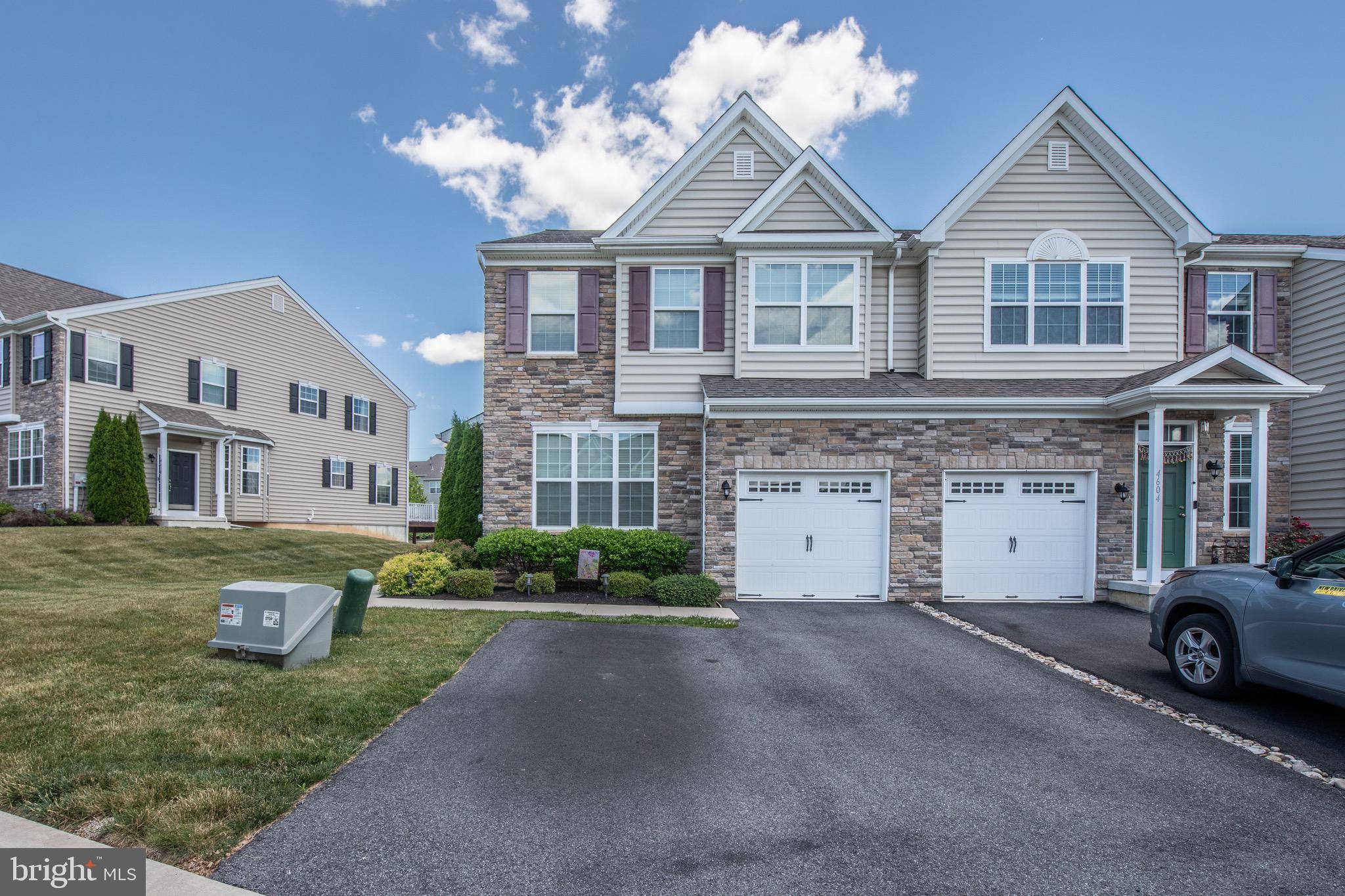 Welcome to Hidden Meadows, where carefree living meets modern comfort
in one of Upper Macungie’s most desirable communities. This beautifully
maintained end-unit townhome offers over 2,000 square feet of thoughtfully
designed living space filled with natural light. The open floor plan creates
an effortless flow between the spacious family room, gourmet kitchen
featuring granite countertops, stainless steel appliances, and an oversized
center island, and the bright breakfast area with access to the rear
patio—making everyday living and entertaining equally enjoyable.
Upstairs, retreat to a generously sized owner’s suite complete with a
walk-in closet and private bath featuring dual vanities and a large shower,
while two additional bedrooms and a full bath provide comfortable
accommodations for family or guests. Built in 2018 and located within the
highly acclaimed Parkland School District, this move-in ready home
combines contemporary style with the convenience of nearby shopping,
restaurants, parks, and major commuter routes.