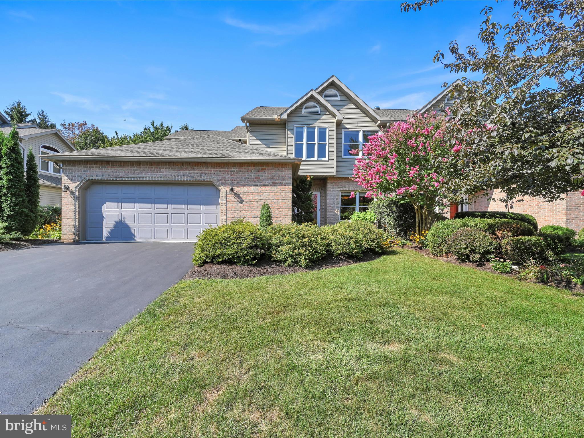AGENTS please read private remarks. If private, spacious, maintenance free with lots of natural light and located close to everything are all on your 'New Home Must Have' list, this is THE ONE.   This meticulously maintained end unit has plenty of space with no waste.  Recent updates include new roof, new skylights, new freshly painted deck.  Unit has cathedral ceilings, is loaded with recessed lighting, hardwood floors, and walk-in closets.  Kitchen has eating space, solid surface countertops, pantry and upgraded glass cabinet doors.  Lovely Dining Room is spacious enough to comfortably seat guests at your next dinner party.  Living Room has cathedral ceiling, skylights, built-ins, gas see-thru Fireplace, access to deck with retractable awning.  First Floor Primary Bedroom suite has Vaulted Ceiling, see-thru gas Fireplace, terrific natural light, huge walk-in closet, access to deck and Bathroom with-stand up shower and jacuzzi tub.  Laundry is on First Floor. Second floor has 2 Bedrooms, full bath and loft also with natural light (beautiful transom windows above windows) and is perfect for office, tv area, guests or gaming.   Finished exposed lower level has Family Room, full Bathroom, patio and tons of storage.  Front entry 2-car Garage has driveway with ample parking, hose bib and access to area above.  Washer, dryer, fridge remain.  Pool table and ping pong table negotiable.   Recent HVAC servicing receipt available upon request.  Deck will be painted color of siding, prior to settlement.