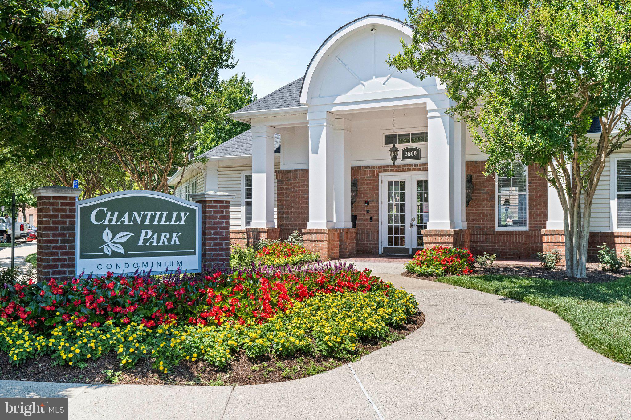 Welcome to Chantilly Park! This Penthouse unit has it all and is move in ready! Enjoy the 2 (TWO) convenient garage spaces that come with this roomy 1 Bedroom + Den unit that measures 966 square feet. Owner has installed a new water heater and a brand new furnace so you won't need to spend any $$ after moving in. features soaring ceilings and oversized windows that flood the home with abundant natural light,
creating a bright and inviting atmosphere throughout. The elegant family room showcases a charming
corner gas fireplace and opens seamlessly to a private covered balcony — perfect for relaxing or entertaining. The modern kitchen has light oak cabinets, stainless steel appliances and features gas cooking. Kitchen opens to a nice dining area and the delightful living room with corner fireplace and ceiling fan.
The bedroom is generously sized - over 20 feet deep with an efficient laundry closet and private door to the bathroom.  The separate den provides great space for a home office or library or a guest bedroom.  See floor plans.  Chantilly Park boasts a nice outdoor community pool, a community room that can be used for hosting or entertaining groups, and a well equipped excercise room.  Located near Chantilly Plaza (Lowes, Restaurants & shops) and a short drive to Dulles Airport. Chantilly HS/Franklin MS/Lees Corner ES. Welcome to your new home!