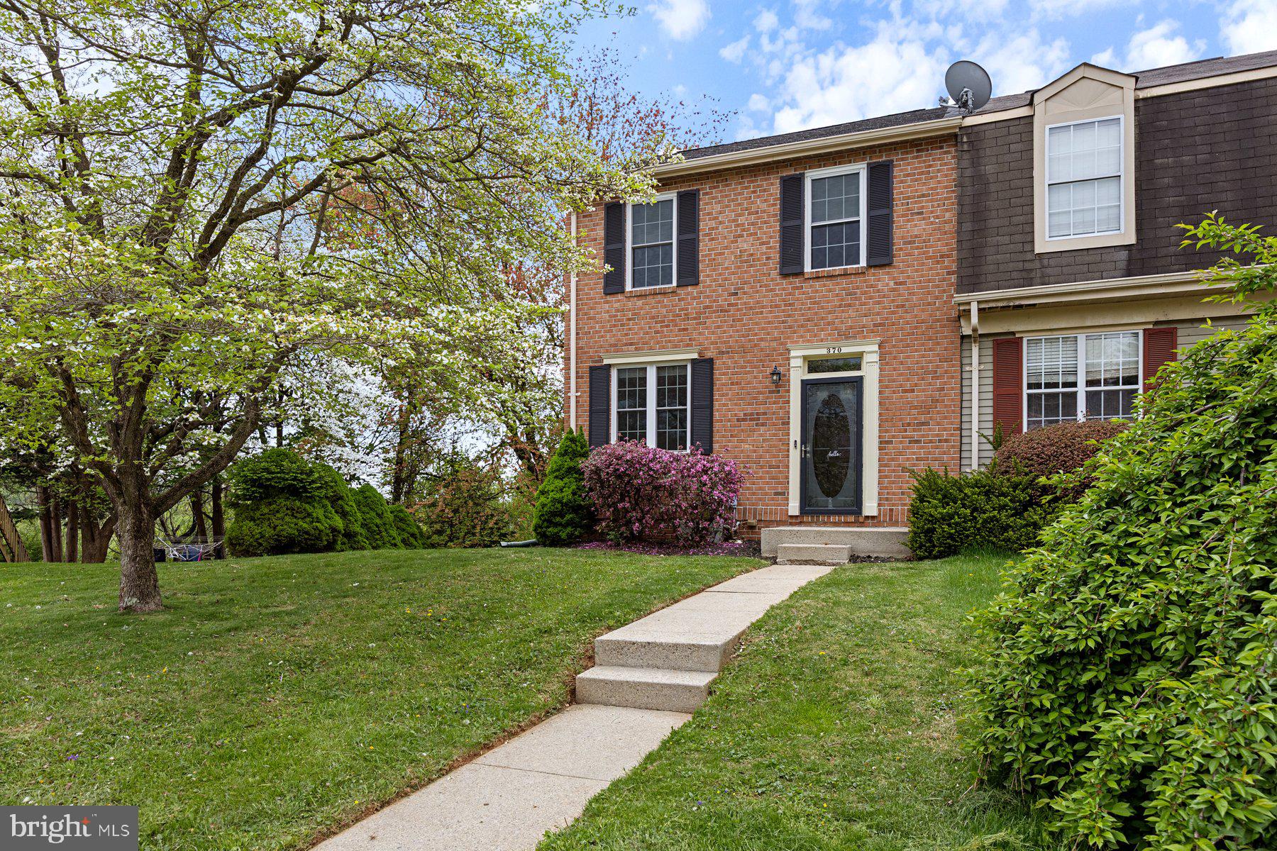 Beautifully maintained and move-in ready 3BR/2.5BA end of row Townhome located in the desirable neighborhood of Carroll Meadows.  Park just steps from the front door into your forever home.  Step inside to a home filled with tons of natural light, beautiful hardwood floors, and a soft color palette.  The main floor offers a spacious living room, dining room, half bath and kitchen.  The kitchen features plenty of cabinets and countertops, stainless steel appliances, and a double stainless sink.  On the second floor are two sizable secondary bedrooms, a large primary with a walk-in closet and a full bath with a double sink vanity.  The lower level is finished offering additional living space featuring a large family room, a half bath, storage, laundry, and sliding doors to a large covered deck.  From the dining room, sliding doors open onto a large deck that leads to a spacious fenced yard filled with green space, a shed and tons of possibilities.  This home is move-in ready, ideal for any new homeowner and is located in close proximity to shopping, restaurants, and commuter routes.