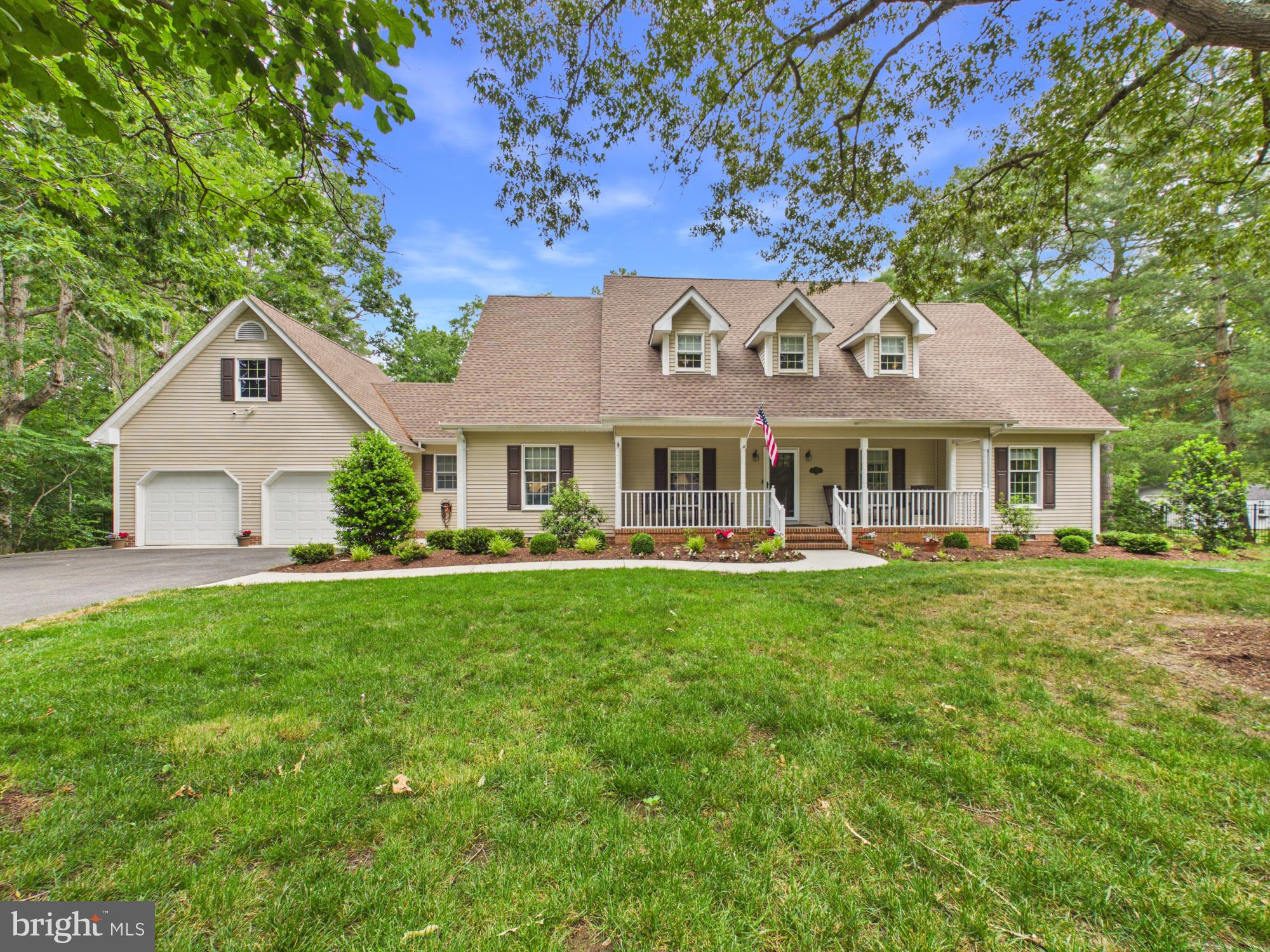 Welcome to your private oasis in Rivers End.  Prepare to be captivated by this stunning 2-story Cape Cod residence, perfectly positioned on an expansive 0.63-acre lot in Seaford’s premier hidden gem community, Rivers End. This established neighborhood offers a peaceful escape complete with a tranquil community pond and picnic area, while keeping you just minutes from everyday shopping, dining, and effortless access to Route 13.

Cross the threshold from the charming country front porch and you are immediately greeted by rich hardwood floors and elegant wood chair rail moldings. To your left, a versatile formal sitting area or flex room awaits—ideal for a quiet reading room or executive home office. The heart of the home unfolds into a generous family room centered by a classic brick fireplace, creating a warm, inviting atmosphere. Slip through into the spectacular four-season sunroom, fully equipped with a dedicated mini-split system for year-round comfort and sweeping panoramic views of your backyard retreat.

The ample gourmet kitchen is an absolute dream for both daily meal prep and grand entertaining. Boasting generous premium cabinetry, high-end modern appliances, and a statement center island with breakfast bar seating capability, this space functions flawlessly. A beautifully placed arched accent window frames peaceful outdoor views directly over the workspace sink. Just beyond the kitchen, a spacious dining room provides the perfect setting for everything from intimate dinners to large holiday gatherings, offering exceptional flexibility for formal entertaining or comfortable everyday dining.

The main level features a massive primary suite designed as a true sanctuary, complete with its own private en-suite bathroom and an incredible walk-in closet fully outfitted with custom organization systems. Venture upstairs to find three additional, generously sized bedrooms and a pristine shared full bath. Tucked behind the second bedroom, you'll discover private access to an expansive, finished bonus room — the ultimate layout for a secluded media room, playroom, or suite.

The outdoor living space is a showstopper. The expansive concrete patio deck offers endless configurations for your favorite patio furniture and grilling stations. Spend hot summer days lounging by your sparkling in-ground pool, and spend cool evenings gathering around the dedicated firepit area. Backed by a dense, mature tree line, this beautifully landscaped property offers unparalleled privacy. Two large detached workshop/sheds provides all the extra storage space or hobby room you could ever need. Schedule your tour today!