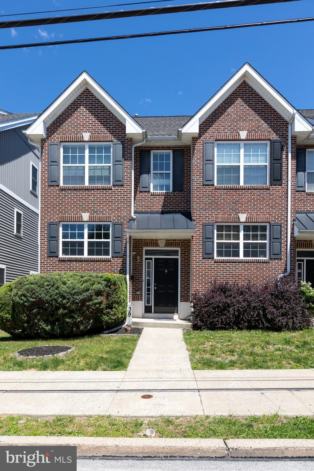 3 Bedroom, 2.5 Bath End-Unit Townhome with attached one-car garage and no association fees! The FIRST floor features an open floor plan with hardwood flooring, crown molding, spacious living room, powder room, and a large kitchen with oak cabinetry, granite countertops, and dining area with gas fireplace. Sliding doors lead to a freshly stained deck with attractive views. The SECOND floor offers a spacious primary suite with private bath and shower, convenient second-floor laundry, hall bath, and a second bedroom with large closet. The THIRD floor features a generously sized third bedroom. New carpeting on second and third floor. Additional highlights include an unfinished walk-out basement with access to the attached garage, plus parking for 3+ vehicles. Conveniently located near parks, public transportation, Routes 23, 76, and 476, as well as shopping, King of Prussia Mall, and Valley Forge National Historical Park.