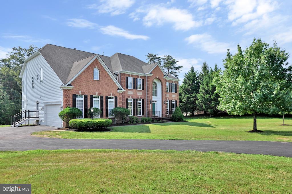 This meticulously remodeled 5-bedroom, 5.5-bathroom masterpiece sits on a wooded 3-acre homesite in the Estates at Cedar Crest. Boasting over 7,000 square feet of impeccably finished living space, this single-family home with 3 finished levels and a 2-car garage exceeds every expectation. Upon entry through the grand 2-story Foyer, be greeted by a grand spiral staircase, and pristine hardwood floors leading to an amazing floor plan. A chef's dream Kitchen is complete with a central island, a Breakfast Nook, and a cozy Sunroom with gorgeous views of the treed backyard. Also on the main level, you will find the Family Room featuring a captivating stone fireplace, a stately Study, a beautiful Conservatory, light-filled formal Living and Dining Rooms, and a spacious secondary entrance from the garage with a Mud Room and separate Laundry Room with a full Bath. This home represents a refined living style that is hard to let go, don’t wait, see it for yourself!  To help visualize this home’s floor plan and to highlight its potential, virtual furnishings may have been added to photos found in this listing.