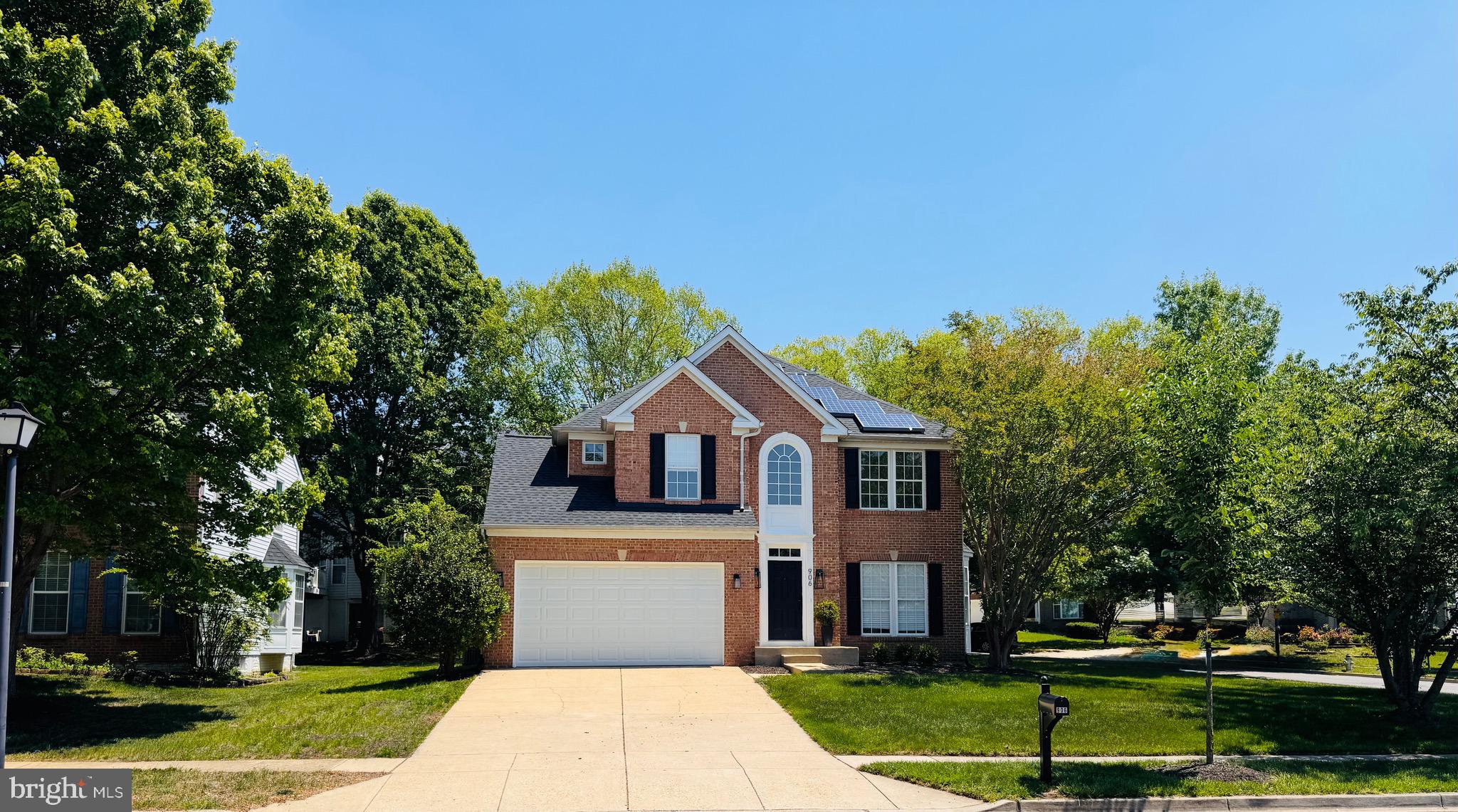 “Welcome Home” be the first to live in this newly renovated luxurious colonial-style home in the highly desirable community of Perrywood. Step into the bright and sunny two-story foyer to admire the grand staircase and chandelier, the open concept flows from the home office space that seamlessly blends with the interior aesthetics with functionality for your workspace. Double columns lead to the formal dining room, perfect for hosting those gourmet dinners and entertaining with friends and family. The chef’s kitchen features Ceasarstone quartz countertops with elevated backsplash, high-end LG built-in premium appliance package and custom cabinetry features matte black hardware, pantry with shelving, the two tiered counter includes a raised breakfast bartop for additional seating then a separate breakfast nook overlooks the backyard. French doors off the kitchen connect for that indoor-outdoor flow that leads to the large TREX composite deck boasting functionality and space for an array of outdoor layout options for food and drink stations when hosting your summertime cookout. The family room has a wall of high windows centered by a gas fireplace with matching stone surrounded by a black wood mantle, creating that perfect soothing warm atmosphere to cozy up in the evening. This home features four well apportioned bedrooms on the second level with plenty of closet space. The primary suite includes a spa like bathroom with double sinks, multiple built-in’s, a floating tub and separate shower, all resting on massive blocks of marble tile flooring that’s well lit by a upper window above the water closet, the walk-in closet features custom built-in drawers to optimize space with stacked hanging options as well as ample upper and lower hanging areas, includes an accessories & jewelry cabinet to tuck your belongings away nicely. The additional bedrooms share a hall bathroom that has it’s own linen closet, tub shower combo with rain shower head, natural marble vanity includes double sinks with space below for storage baskets. Main level has a powder room for guests and the laundry room includes EnergyStar washer and dryer. Head down to the basement that has been fully finished with recessed lighting throughout, this large open area adds additional living space for a home gym, movie theatre and recreational area, plus includes a full bathroom for your convenience. This Smart Home has all the bells and whistles, wi-fi controlled thermostat, energy efficient heating, cooling and lighting, Tesla solar panels and so much more. Luxury Sterling Oak vinyl wide plank flooring on the main and upper level, the basement has upgraded padding and stain resistant soft Berber carpet. New garage door that opens soft and quiet includes two remotes. This gorgeous home sits on a corner lot that adds additional privacy. The front yard has mature pink blossoming cherry and crepe Myrtle trees and back yard has mature Burch trees, all beautifully landscaped for your outdoor enjoyment. A new architectural charcoal black asphalt roof, new HVAC full heating and cooling system has been recently installed. This highly established family oriented community is know for its spacious homes, tree lined streets, quiet wooded surroundings with amenities including a large swimming pool, tennis and pickleball courts, basketball courts, soccer field, tots playground and walking trails. The community association actively manages and hosts annual events including a popular Jazz Social. Close proximity to Washington DC, Joint Andrew’s Air Force Base and convenient for commuters. An array of shopping nearby includes Costco, Wegman’s supermarket and a host of fine dining options in the nearby Woodmore shopping center. In close proximity to Oak Creek Golf Club & Country Club at Woodmore.