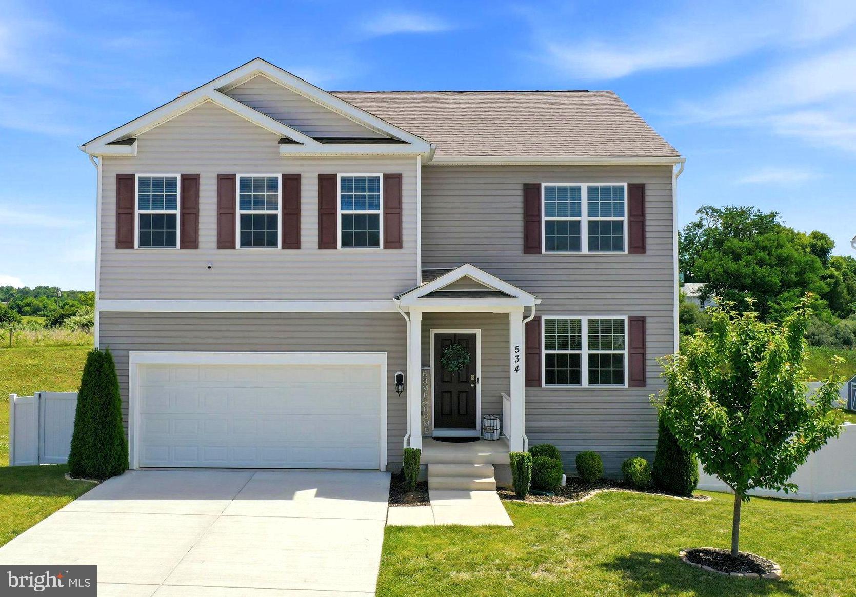 534 Weeks Court is a spacious 5-bedroom, 3-bath Colonial situated on a 0.34-acre lot in the established Shenandoah Crossing community of Berryville. This home features a bright, open interior across three finished levels. The main level includes a private office ideal for remote work or quiet retreat and a private bedroom with a full bath that is ideal for family or guests.  The airy living room flows into the dining area and kitchen.  The gourmet kitchen is equipped with gorgeous granite countertops, stainless steel appliances, a gas range for aspiring chefs and a convenient oversized island with seating and a farmhouse sink.  Adjacent outdoors to the dining area is an elevated Trex deck overlooking a fully fenced backyard with peaceful open views and no immediate rear neighbors which offers a sense of space and calm that's increasingly hard to find.  The upper level offers a large loft-style family room that serves as a relaxed second living area.  The primary suite with two walk-in closets has an attached bath featuring dual vanities and a walk-in shower.  Three additional bedrooms (2 of which have never been occupied) share a full hall bath along with a conveniently located laundry room. Additionally, the partially finished lower level provides a versatile recreation room and ample storage space offering the opportunity to customize additional living space.  The water treatment system is a Culligan drinking and water softner system combined.  Located just minutes from downtown Berryville, this property offers easy access to Route 7, Route 340, and Route 17, providing a perfect balance of Clarke County charm and convenient commuter access to Winchester and Northern Virginia.  Schedule your viewing today!