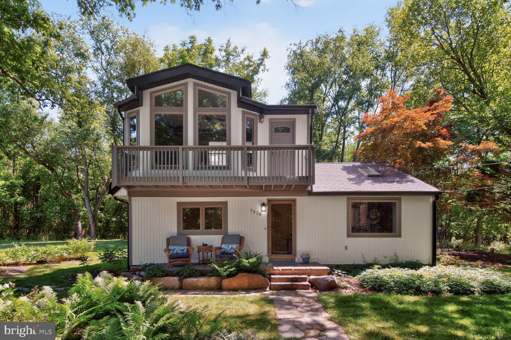 Tucked away on a private road in the heart of Cloverly, 1530 Murphy Lane offers a charming park-like retreat just 1 mile to shopping and dining, near the state-of-the-art Good Hope Community Center, and a short distance to bus stops. This unique Silver Spring find features 2 bedrooms and 1.5 baths with a flexible layout: the lower level includes a living room, dining room, updated kitchen, and laundry room; the upper level offers a spacious family room and a primary bedroom with ensuite half bath.
Outdoor living shines with a serene koi pond, patio, two sheds, and an upper-level balcony—ideal for entertaining or quiet relaxation. Thoughtful updates include freshly painted interior and exterior, roof (approx. 1 year), HVAC (approx. 5 years), replacement windows, kitchen update (approx. 6 years), and a new well bladder (approx. 1 year). Peaceful setting, convenient location—welcome home to Cloverly.
