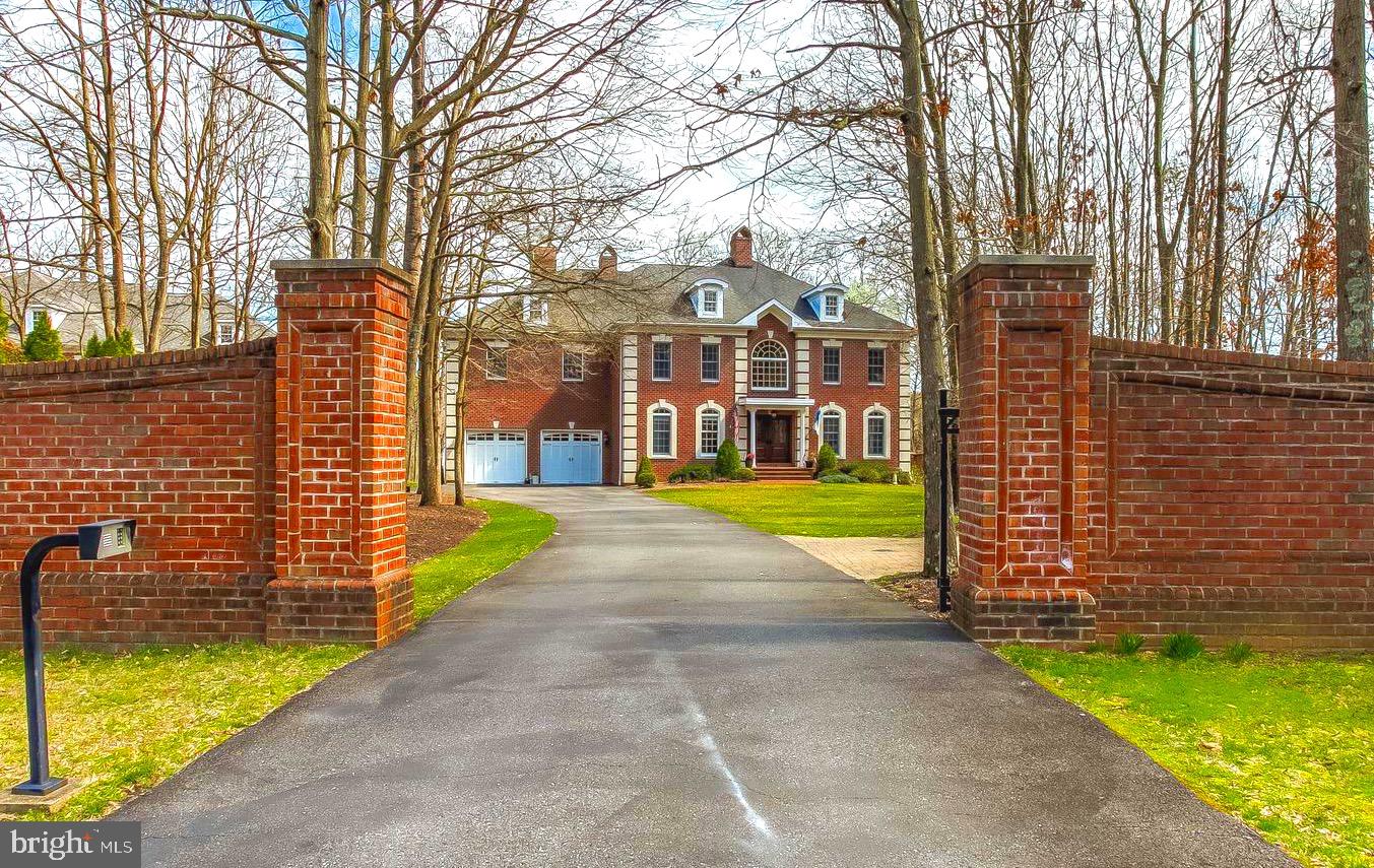 Welcome to Dreams Point in Jamestown on the Magothy.  Stunning architecture, fine fit and finish, gated driveway, pristine condition, and deep protected water are only a few of features that make this property a true gem.  Situated on a private lot, and built at an ideal elevation above Forked Creek, this custom brick 5 bedroom/4 baths/2 half baths home features beautiful wood floors, custom trim, a mosaic tile foyer, impressive curved staircase, 4 gas fireplaces, an exquisite  gourmet chef's kitchen with custom cabinetry,  luxury appliances, two large pantries, a breakfast area, two custom work stations and a gourmet coffee bar.  This home also offers a waterfront great room with soaring ceilings, a stately main level home office with gas fireplace, over a dozen Swarovski crystal chandeliers throughout the home, expansive master suite with luxury bath and separate walk-in closets, waterfront screened porch and deck, and many other features you would expect to find in a home of this quality craftsmanship.  The expansive lower level includes an au-pair/guest suite, family room with custom built-ins, game room area, gym/yoga area and a large storage and workshop area. The discreet and maintenance free solar panel system provides clean energy and a significant reduction in energy costs. Ideally located for enjoying the best of what our area has to offer by land or water.  Great access to the Chesapeake Bay, and a short ride to Dobbins Island, Dreams Point is a boater's dream.  The deep water pier is very protected and includes water, electric and a Magnum lift.  Welcome to the best of waterfront living on the Magothy River.