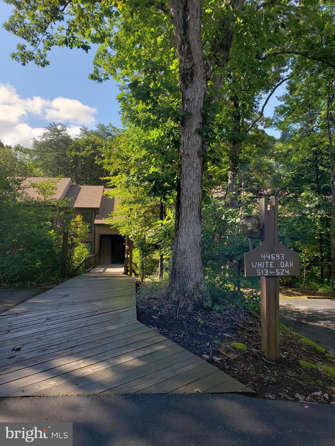Top level condo convenient to shopping, groceries, entertainment.  Needs new flooring, paint, etc.  Great opportunity.