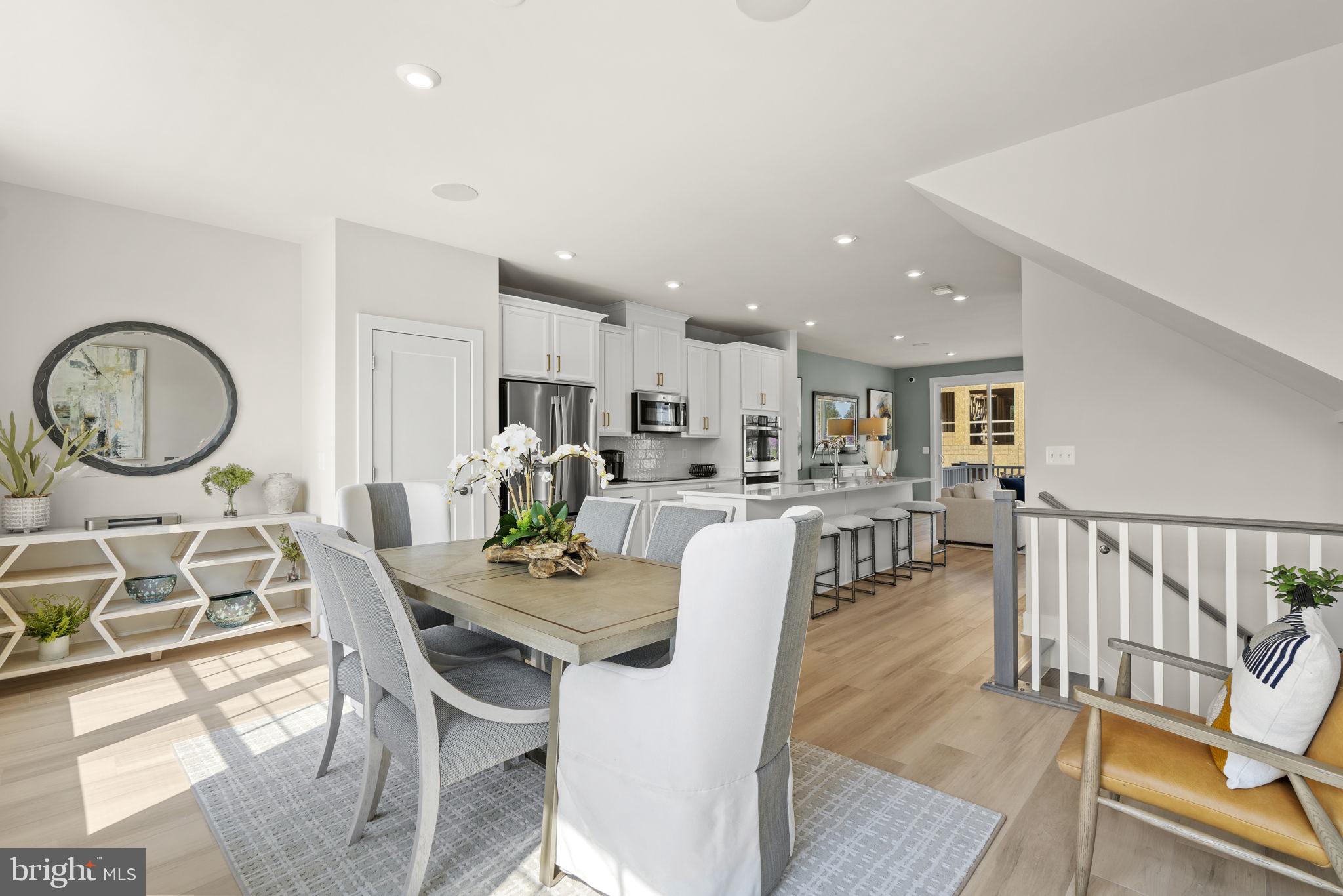 Brand new Stanley Martin townhome! This 3-bedroom end unit townhome features an open-concept floorplan, spacious gourmet kitchen with large sit-down island for friends to gather around, and plenty of room for the home chef and food enthusiast alike. A large, yet cozy family room and dining area make this space feel complete. At the end of the day, retreat to your primary bedroom with a private en suite bath and spacious walk-in closet. This room may become your favorite and will certainly inspire you to put your feet up and relax. Down the hall, two additional bedrooms with a full bathroom offer comfortable options for family and friends. Downstairs, the lower level recreation room with half bath is a comfortable spot for guests or you can transform into a private home office. Photos shown are from a similar home. Design selections have not yet been chosen for this home. There is a limited time to personalize this home, contact us today to schedule your appointment!
With lots of local shopping and dining options, access to Routes 28, 234, I-66, and Historic Old Town Manassas just around the corner, you'll love the location and convenience Bradley Square offers. Schedule your tour today!