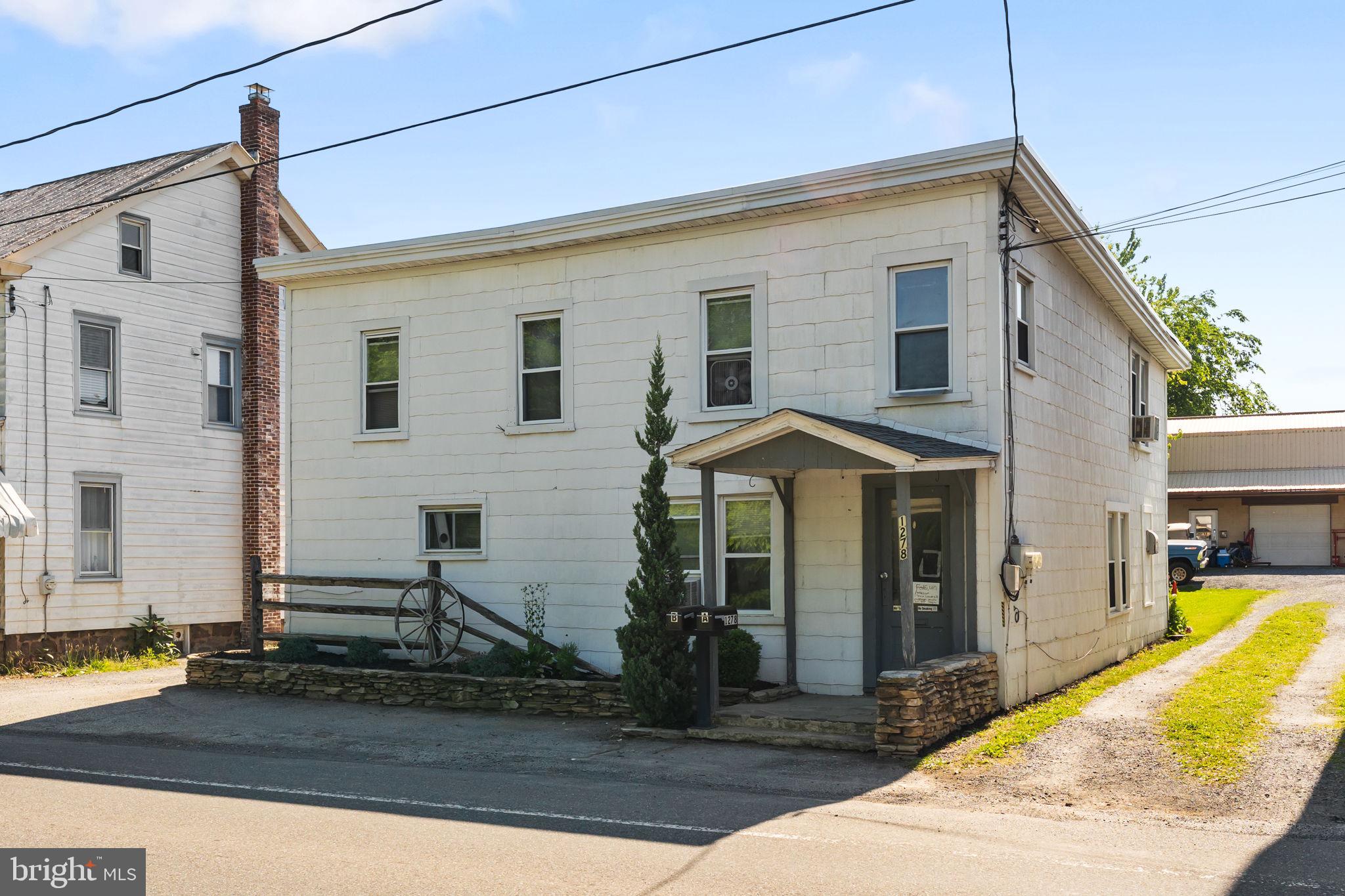 Excellent investment and potential Airbnb opportunity in Brecknock Township, Denver PA! This well-maintained duplex features two occupied long-term rental units, making it a strong addition to any investment portfolio. Each unit offers 2 bedrooms, 1 full bath, and convenient in-unit laundry. The property has separate electric and heating systems for each unit, helping to simplify management and tenant utility responsibilities. The upper unit currently rents for $900/month and the lower unit rents for $950/month. The first-floor unit also features a recently updated bathroom with a handicap-accessible shower and new carpeting. Major improvements have already been completed, including recent sewer pipe improvements (2025), a newer rubber roof with a 20-year warranty (2024), new HVAC system (2024), updated water heaters, and a new pressure-treated deck. Located in a convenient Denver location within Brecknock Township, this property offers reliable rental income with solid long-term tenants already in place. Whether you’re looking to expand your investment portfolio or explore the potential for a future Airbnb or short-term rental opportunity, this duplex offers excellent versatility with many important capital improvements already completed!