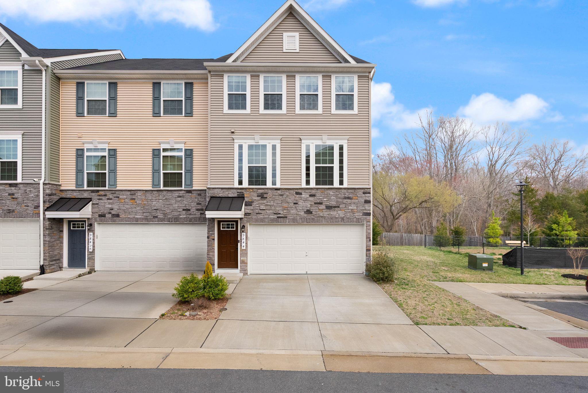 Welcome to thus exceptional end-unit townhouse combines ultimate privacy with an abundance of natural light. Nestled in the highly sought-after area of Fredericksburg, this three-story beauty offers a seamless blend of open modern layout and sophisticated design, creating a serene living space for relaxing and entertaining. 

As you enter the ground level, you'll be greeted by a versatile recroom, ideal for an office, playroom, or in law suite.  On the second level, the inviting living room provides an ideal setting for entertaining or relaxing after a busy day. The expansive eat-in kitchen is a chef’s dream, complete with a large island, granite countertops, generous pantry, and plenty of cabinetry for all your culinary essentials. The home is bathed in natural light, thanks to an abundance of windows throughout.

The top floor features a spacious primary suite, offering ample room for a king-size bed with plenty of space to spare. A tray ceiling adds a touch of sophistication, while the ensuite bath provides a spa like retreat, complete with modern fixtures and a walk-in closet. Two additional well-sized bedrooms offer plenty of room for family or guests. The two-car garage adds practicality and extra storage options.
As an end-unit, it offers a larger outdoor space, perfect for gardening or play. The large composite deck is perfect for summer BBQs or enjoying a glass wine  in the evening. 

Community amenities include a pool and a dog park, enhancing your lifestyle. A commuter dream with effortless access to major routes and the VRE just a mile away. Shopping and highly rated dining options are nearby, including an award winning hospital.

Don’t miss your chance to own this stunning townhouse that offers the perfect mix of luxury, convenience, and modern living in an unbeatable location. Experience contemporary elegance and thoughtful design in a home that has it all.