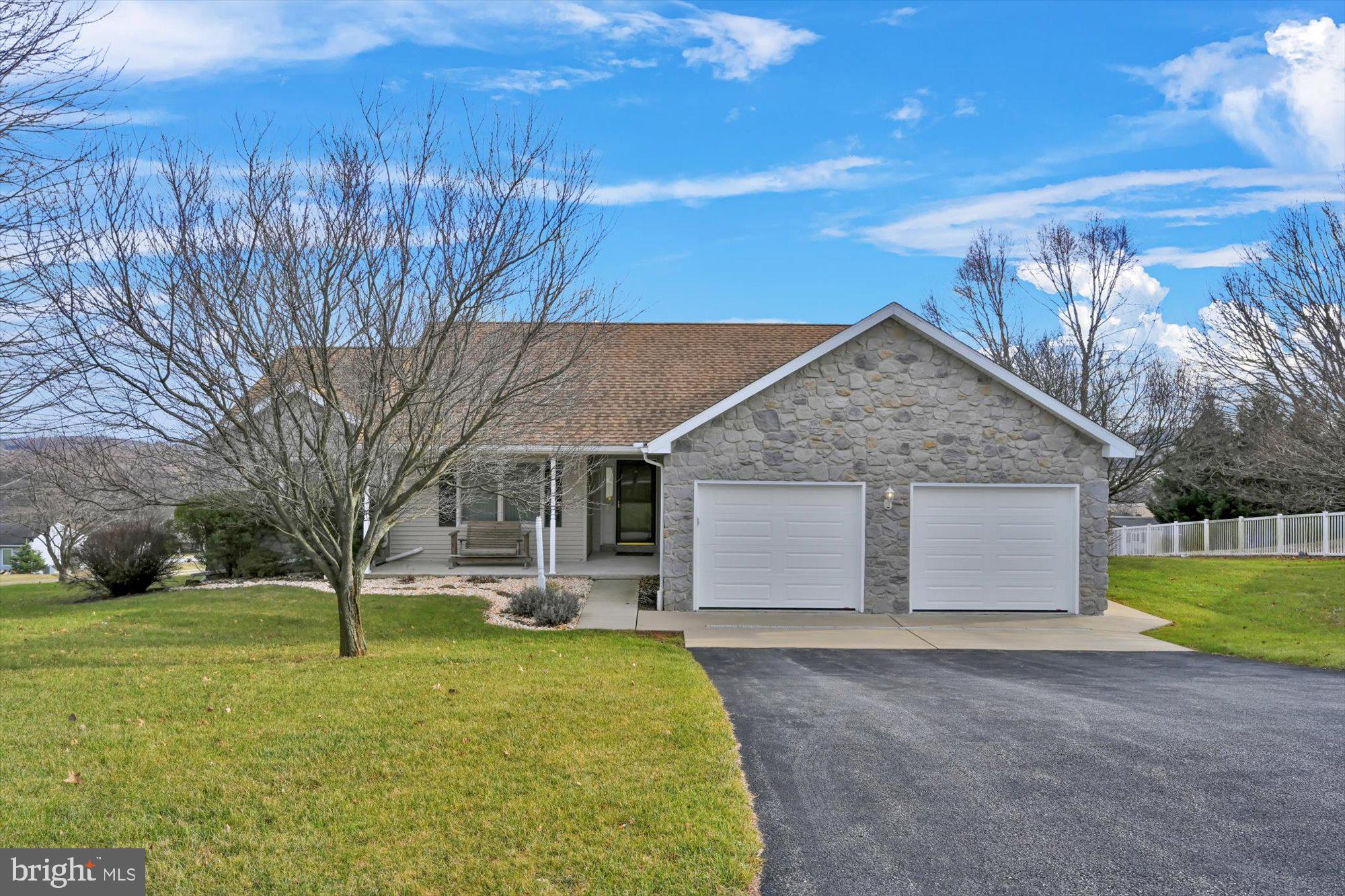 You do not want to miss this beautiful 3 BR 2 BA ranch-style home in Red Lion Schools. The home is so inviting with an open floor plan, spacious living room featuring a gas fireplace. The modern kitchen has granite countertops, an island & a double oven. There is a separate dining area with sliding glass door which lead to the maintenance-free deck. There is a primary bedroom with a walk-in closet & primary bath with double vanity and separate shower stall. There are 2 additional bedrooms and another full bath all on the main floor. The basement has a finished game room, workshop &  superior wall system There is a large backyard for all your outdoor activities and a 2-car attached garage. This home is clean, updated, and move-in ready. schedule your showing today. The separate lot behind the house is available for sale separately at 49,900 or can be purchased as a package with the house.