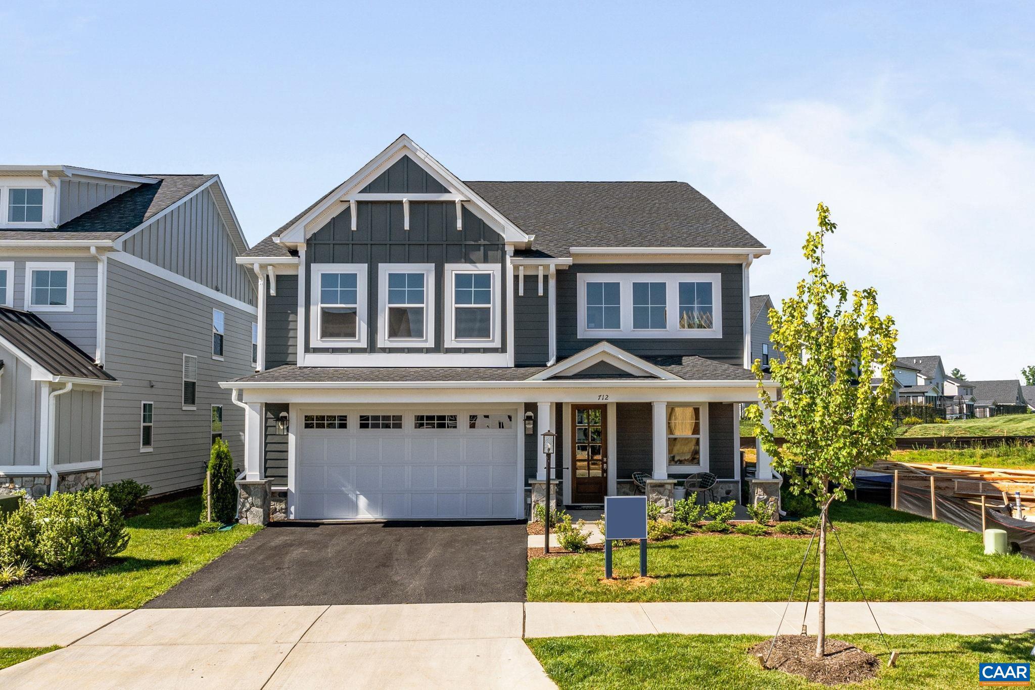 Exciting opportunity to build your own Marigold floor plan in The Grove at Brookhill, with an estimated 7 to 8 month build time. This is one of the newest plans available in the community's latest section along Route 29. What makes the Marigold stand out is the size of its bedrooms, each one comes with a roomy walk-in closet. The main level features an open layout with an L-shaped kitchen, walk-in pantry, and plenty of workspace at the center island. A covered porch, flex space, mudroom, and half bath add to the functionality of the first floor. Upstairs, a loft area can be used as a second living space or converted into a fourth bedroom with its own full bath. The primary suite is nearly 18x20 feet with a 17x8 foot walk-in closet and a spacious private bathroom. Two more well-sized bedrooms, a split-layout hall bath, two linen closets, and a laundry room complete the upper level. You can also choose to add a third-floor loft with an additional bedroom and bath. Photos are of a similar home and may include optional or upgraded features.,Maple Cabinets,Painted Cabinets,Quartz Counter,White Cabinets,Fireplace in Family Room