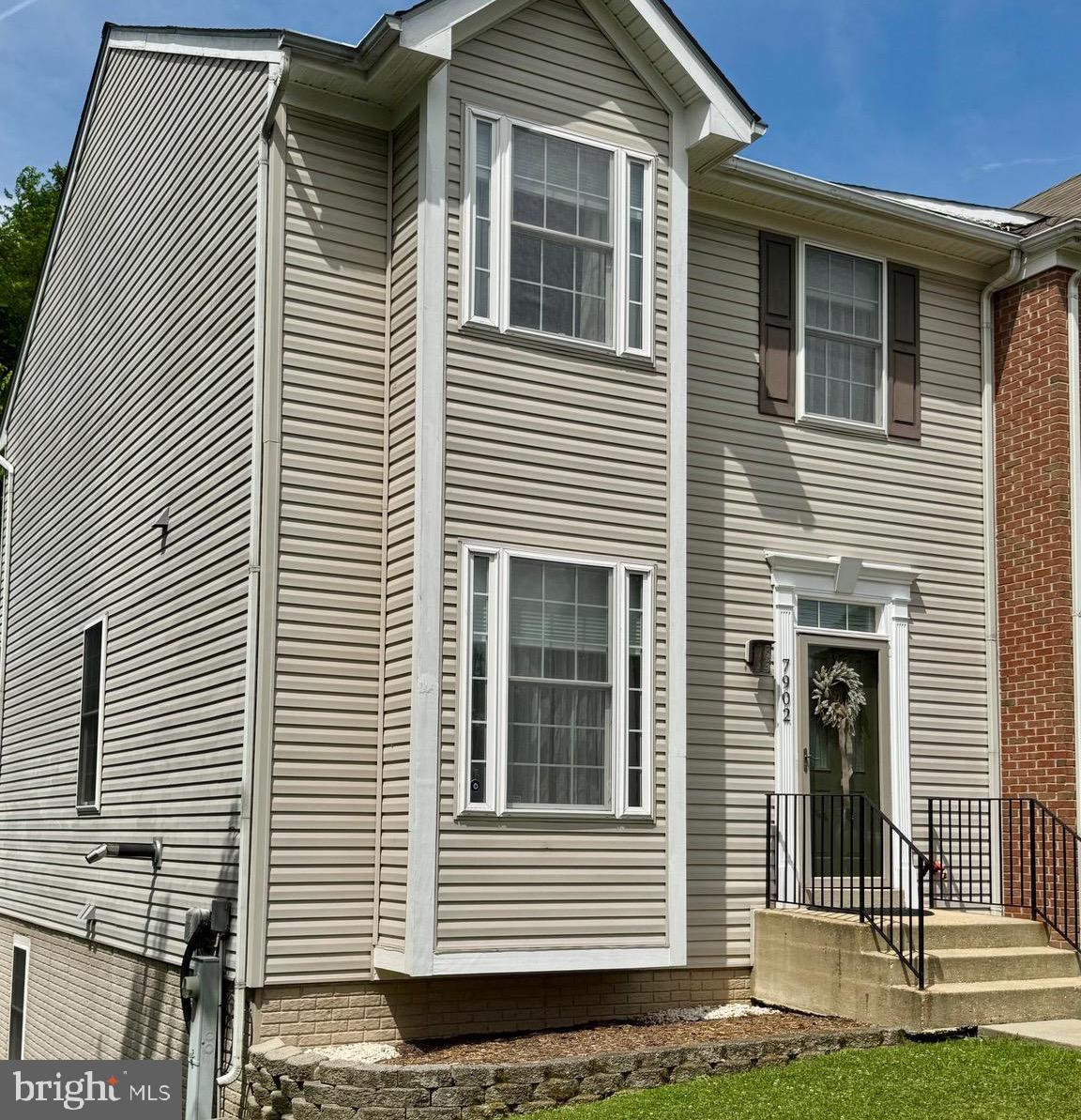 Fantastic opportunity to own this beautifully maintained END UNIT townhome situated on arguably the best lot in the highly desirable Bayview Hills community! Backing to open space and offering exceptional privacy, this home combines a peaceful setting with an unbeatable location for outdoor enthusiasts. Just steps from the Fishing Creek Rail Trail, you'll enjoy easy access to jogging, biking, kayaking, boating, fishing, and birdwatching. Bayview Hills residents also enjoy nearby RV and boat storage, access to top-rated schools, outdoor concerts at Rod 'N Reel, waterfront dining, shopping, Kellam's Field, the Northeast Community Center, and exclusive residents-only access to Brownie's Beach. Being sold FULLY FURNISHED (excluding housewares and artwork), this home is truly turnkey—simply move in and start enjoying the Chesapeake Beach lifestyle! Natural light fills the thoughtfully updated interior, which features luxury vinyl plank flooring, a new roof, skylight, and LeafGuard gutters (2021), plus a new dual-zone HVAC system (2022). Additional upgrades include modern lighting fixtures, energy-efficient wood pellet stove, and newer GE appliances. Two dedicated parking spaces are located directly in front of the home, with ample guest parking nearby. The main level offers an inviting open floor plan designed for both everyday living and entertaining. Features include a spacious living room with pellet stove, dining area, convenient powder room, bright morning room, and an upgraded kitchen with granite countertops, large center island, and newer GE appliances. Step outside to the private deck overlooking scenic open space—an ideal spot to enjoy your morning coffee or unwind at the end of the day. Upstairs, the spacious primary suite features a beautifully renovated en-suite bath, walk-in closet, and sitting area. Two additional generously sized bedrooms and a full hall bath complete the upper level. The finished walk-out lower level provides more than 800 square feet of versatile living space, including a recreation room, full bathroom, potential fourth bedroom, home office, in-law suite, laundry room, utility room, and additional storage. Sliding glass doors lead to the fully fenced backyard and attractive stone paver patio, creating even more space to relax or entertain. Don't miss this rare opportunity to own an energy-efficient, move-in-ready home in one of Chesapeake Beach's most desirable communities. Conveniently located for commuters with easy access to Joint Base Andrews, Washington, D.C., Annapolis, the Suitland Metro Station, and regional commuter bus routes.
