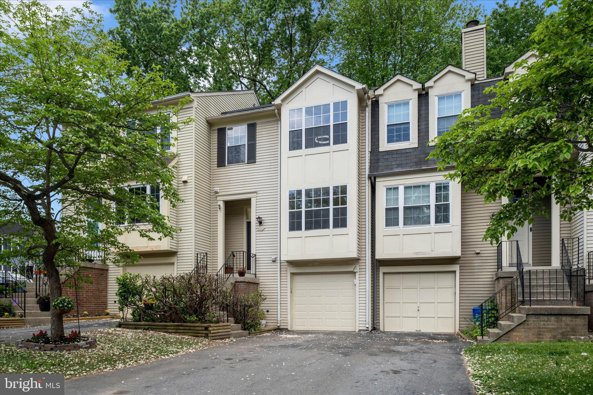 Open House 1-3 pm on 05/30and 05/31 . Welcome home to this beautifully updated, move-in ready townhome offering 3 bedrooms, 2.5 baths, a finished lower level bonus room, one-car attached garage, and additional extended driveway parking, with low HOA and low electric bills thanks to solar panels, 
Step through the front door and feel the warmth of updated hardwood floors, fresh paint, elegant crown molding, and modern fixtures throughout. Sunlight fills the inviting living room, creating the perfect place to relax or gather with guests. Continue into the dining room, where a stylish wet bar and built-ins add charm, value, and everyday functionality. While entering the house, you will appreciate the convenience of a main-level powder room and coat closet.
The heart of the home is the spacious eat-in kitchen, featuring granite countertops, backsplash, abundant cabinetry, updated stainless steel appliances, generous prep space, and updated finishes. Open the new sliding doors and step onto the double deck overlooking a low-maintenance backyard, ready for summer BBQs, morning coffee, or unwinding in the hot tub, conveyed as-is.
Upstairs, retreat to the bright primary suite with a walk-in closet and updated private bath with modern vanity and fixtures. Two additional bedrooms and a full hall bath with updated vanity complete the upper level.
The finished lower level adds even more flexibility with a large recreation room or bonus room ideal for movie nights, a gym, office, or possible 4th bedroom.
The expanded one-car attached garage offers excellent workspace potential, while the parking pad easily accommodates an additional vehicle.
Enjoy peace of mind with major updates including roof 2024, water heater 2023, HVAC 2024, updated lighting, plumbing fixtures, and electrical fixtures throughout.
Perfectly located near Great Seneca Highway, I-270, MARC train, shopping, and dining, this impeccable home offers the space, updates, and lifestyle you have been waiting for. Welcome Home!