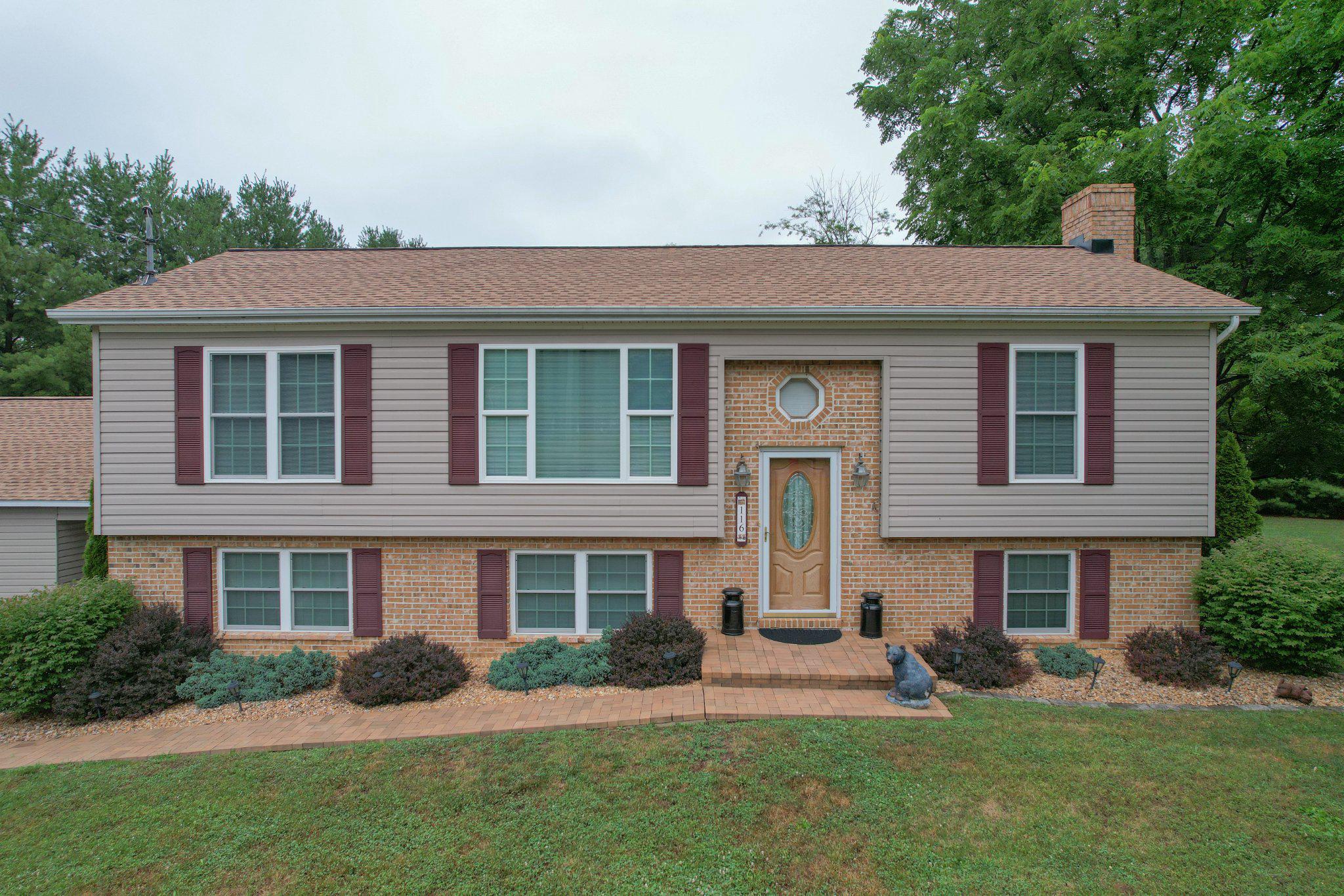 Welcome home to this beautifully maintained split level home nestled on 1.01 acres surrounded by mature trees and attractive landscaping. Built in 1989, this spacious home offers 4 bedrooms and 2.5 bathrooms, combining timeless charm with comfortable living. 

Inside you will find original hardwood floors that add warmth and character throughout the main living areas. Downstairs , a wood burning stove provides an efficient secondary heat source capable of heating the entire home. Outside, enjoy the peaceful setting and a generous yard that blends naturally with the wooded surroundings. Sit back and relax after a hard day on the rear deck overlooking the peaceful backyard. 

The property also features a car lift, making it an excellent opportunity for automotive mechanics, hobbyists or anyone needing additional functionality. Conveniently located while offering privacy and space, this move-in ready home is one you wont want to miss!