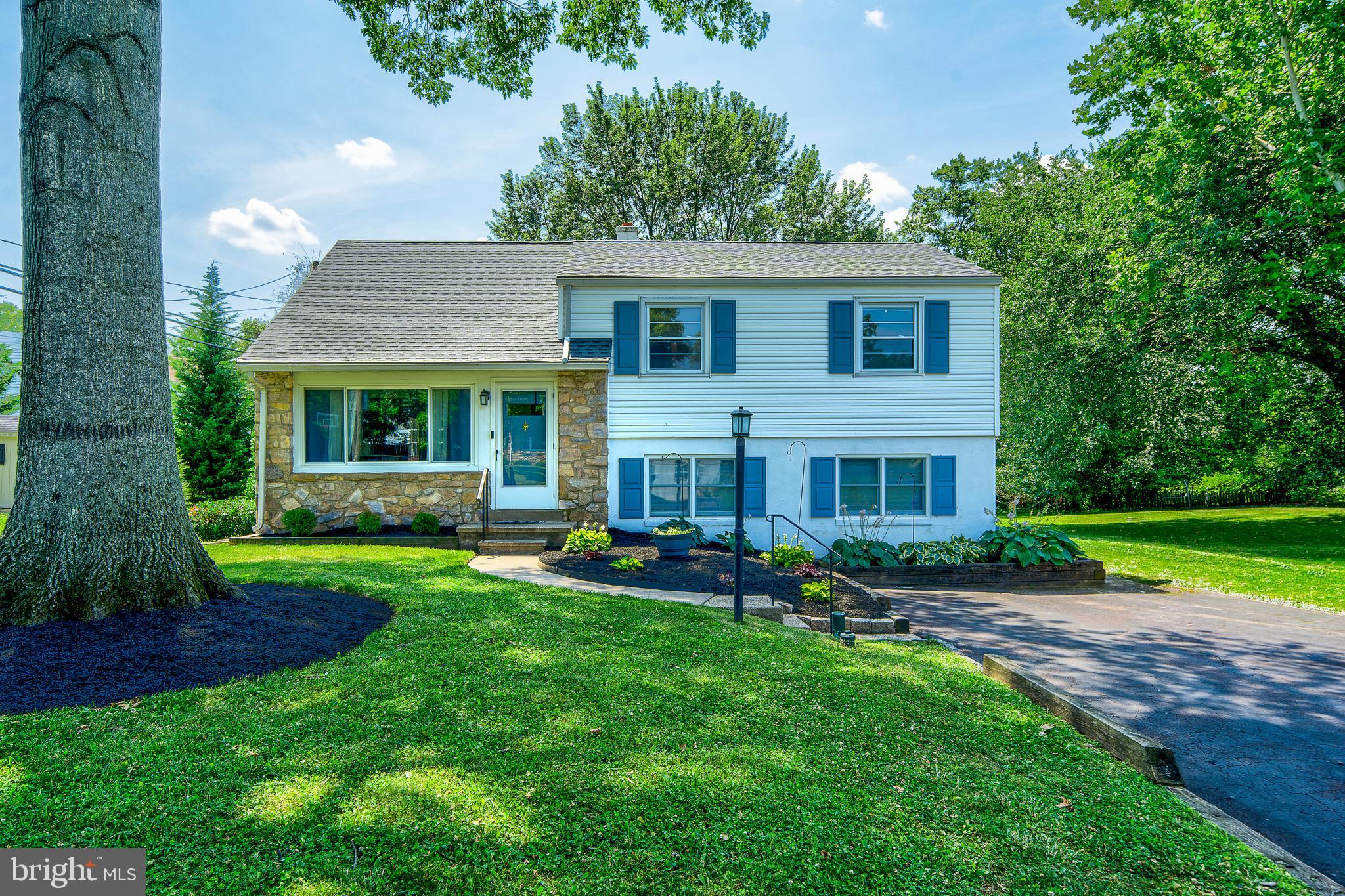 Welcome to 1008 Pioneer Road, a 4-bedroom, 2 full bath home in Towamencin Township's sought-after Inglewood Gardens neighborhood, served by the North Penn School District. The headline here is condition: a complete kitchen renovation in 2023 with all-new appliances, a new roof on both the house and shed in 2025, and hardwood floors freshly refinished in 2026 — the big-ticket items are done, and done recently. The showpiece kitchen delivers dark shaker cabinetry with crown molding, an entire wall of floor-to-ceiling pantry storage, white quartz counters, and an oversized island with seating that opens the space to the adjoining living areas. An apron-front farmhouse sink sits beneath the window, framed by a wood-plank tile backsplash, while the stainless appliance suite — gas range with chimney hood, dishwasher, built-in microwave drawer, and French-door refrigerator — was all new in 2023. Recessed and pendant lighting keep it bright at every hour, and a glass-paneled door steps directly out to the rear deck for easy grilling and entertaining. Beyond the kitchen, gleaming hardwoods carry warmth through the living spaces, natural light pours through the large front window (2018), and central air keeps things comfortable — the exterior compressor was replaced in 2018 as part of this home's consistent record of upkeep. Two full bathrooms serve the four bedrooms, and the finished lower level adds a generous bonus room — flexible space for a home office, gym, media room, or playroom. Set on a quiet street minutes from Lansdale Borough's shops and restaurants, major employers, the PA Turnpike Northeast Extension, and the Lansdale/Doylestown regional rail line. Homes in Inglewood Gardens are moving quickly — schedule your showing promptly.