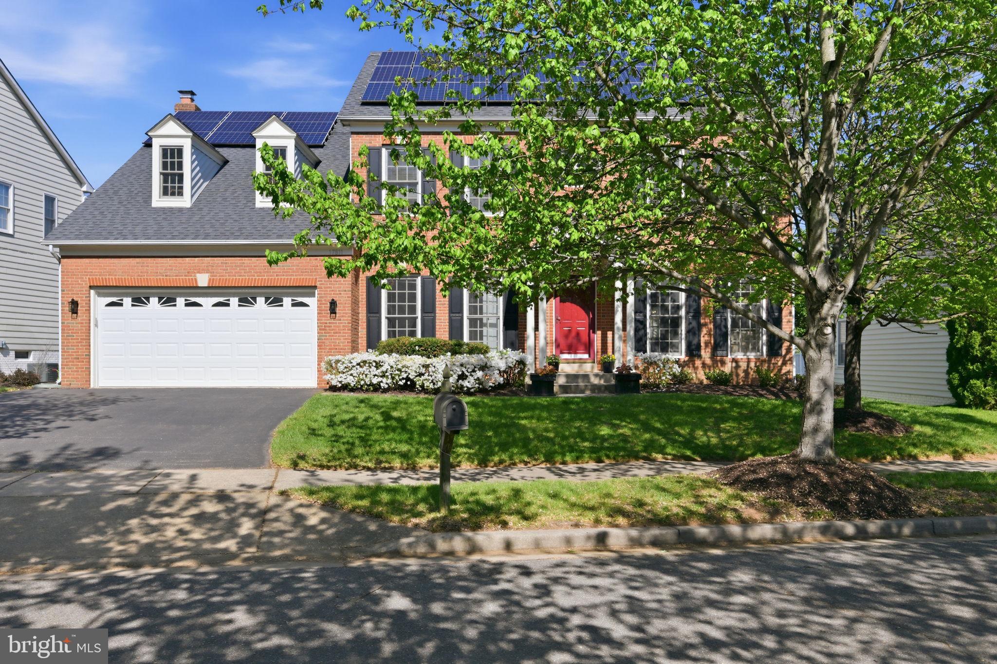 Amazing  Highly Energy Efficient  Home includes owned solar panels and a geothermal heating /cooling system, offering energy efficiency and long-term savings.This stunning home in the highly desirable Clopper’s Mill West community is move-in ready and waiting for its next owner. This beautifully maintained two-story brick-front colonial has been freshly painted and offers a perfect blend of comfort, style, and functionality.

At the heart of the home is the gourmet kitchen, featuring stainless steel appliances, a spacious center island with abundant storage, and a convenient serving station complete with a wine refrigerator—ideal for entertaining. The kitchen opens to a generous family room with a cozy wood-burning fireplace, creating a warm and inviting space for gatherings. Both areas provide direct access to a newly built, expansive deck—perfect for outdoor dining and relaxation.

The main level also includes formal living and dining rooms with elegant hardwood floors, along with a private home office, making it easy to balance work and everyday living.  A half bath and a laundry room with access to the two-car garage add to the home’s practicality.

Upstairs, gleaming hardwood floors continue throughout. The luxurious primary suite offers a true retreat, complete with a spacious walk-in closet featuring custom built-ins, a separate sitting area, and a spa-inspired en-suite bath. Three additional generously sized bedrooms also include ample closet space with built-ins. An updated hall bath with linen storage and a large vanity completes the upper level.

The walk-out lower level, expands your living space with a large recreation room, a versatile bonus room, a wet bar, a full bath, and plenty of storage—ideal for entertaining or multi-purpose use.

Outside, enjoy a flat, usable yard perfect for play, gardening, or relaxing.