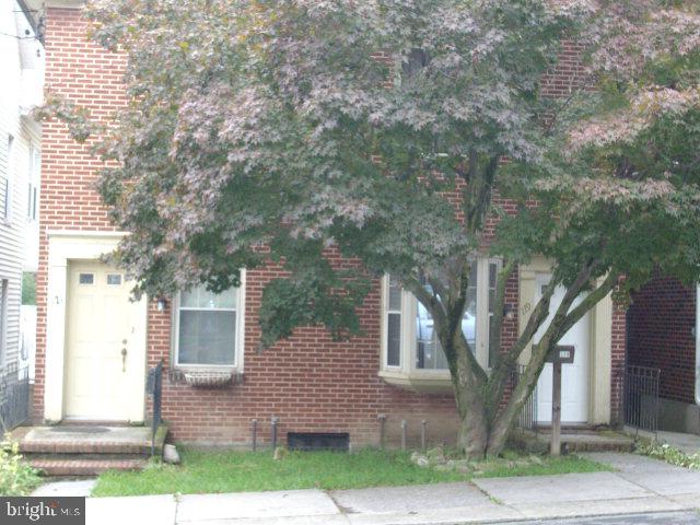 Calling all investors!  Separate entrances for each unit.  Both units have their own furnace, water heater, electric, laundry!  119 is a ground floor 2 bedroom apt w/ HW flooring, bedrooms have built in closets, stove, refrigerator.  121 is an upstairs 1 bedroom apt w/ HW flooring.