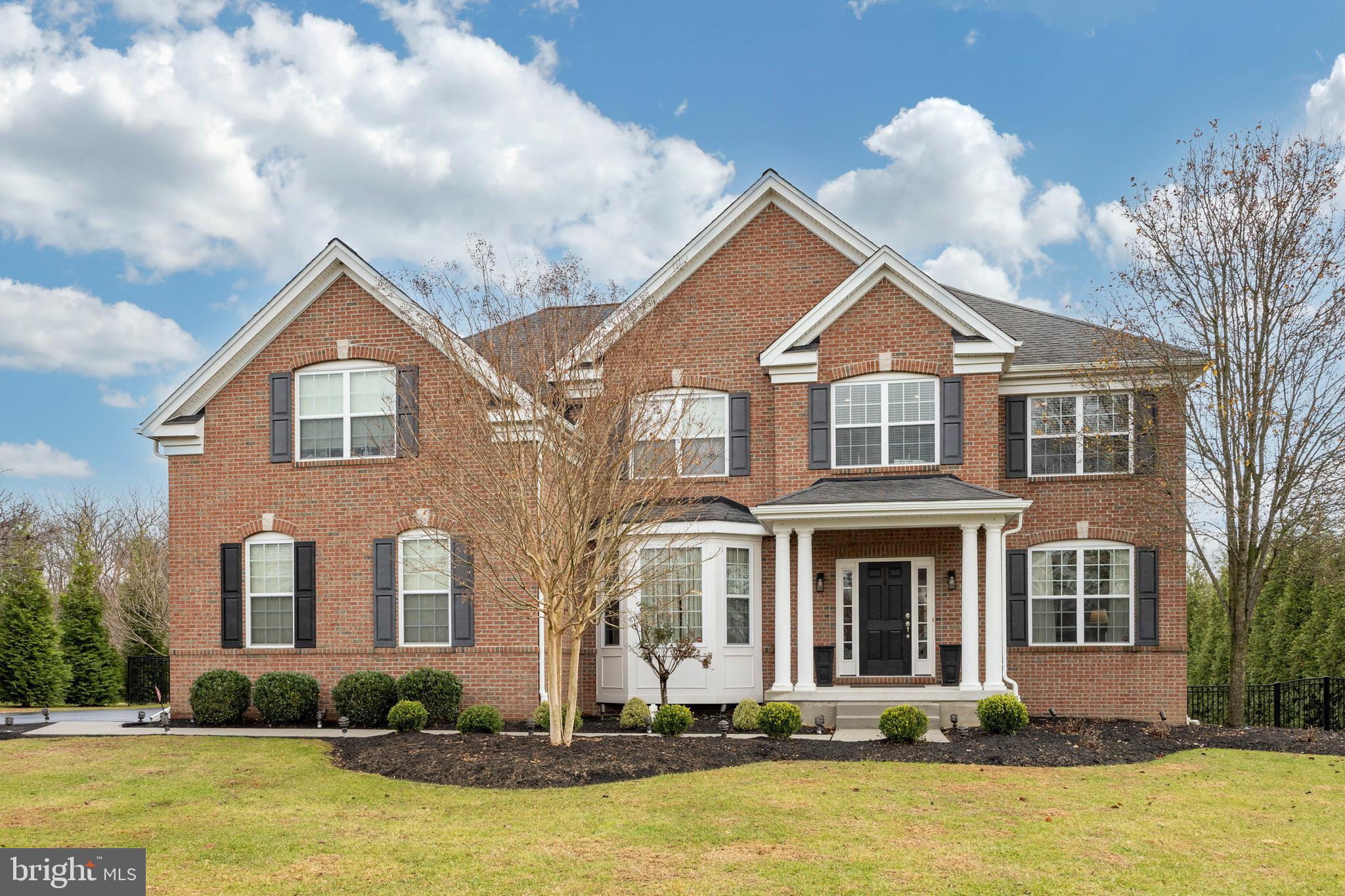 Every once in a while, a one-of-a-kind property comes to the market and that time is now! 154 Freedom Rider Trail is a stunning estate home featuring a combination of valued features you will not find anywhere else. It sits proudly on a premium, flat lot in the sought after Preserve at Squire Cheyney neighborhood. Built in 2012 with the original owners, no detail was overlooked and no expense was spared in the thoughtful design, and it shows! As you approach the home, you will immediately notice the handsome brick front, charming covered entry and mature landscaping. A brilliant floor plan awaits inside that perfectly blends traditional design with every accommodation for today’s lifestyle! A dramatic 2-story entry welcomes you into the home. Take note of the gorgeous hardwoods, waterfall staircase, extensive millwork and upgraded lighting. The main level is highlighted by the inviting kitchen and breakfast room. The spacious kitchen was designed for a chef! It features upgraded cabinetry with glass accents, granite counters, tile backsplash, huge island, stainless appliances, double oven, 5-burner cooktop, and walk-in pantry! The kitchen opens to the breakfast and family rooms. Prepare to be wowed by the massive and bright breakfast room! There are an abundance of windows and a door that leads to the huge (1,000 sq ft) custom deck and oversized (500 sq ft) brick patio. The cozy family room features a vaulted ceiling, gas fireplace with custom molding to ceiling  and 2 double-story windows boasting natural light and views of the perfect backyard. The main level also features a traditional living room with custom tray ceiling, formal dining room, private office with built-ins, laundry and powder room. The upper level is highlighted by the primary bedroom suite. It is massive with tray ceilings, a sitting room and 2 walk-in closets. Step into the just finished (Nov 2025), completely updated primary bath and unwind with the large tile walk-in rain shower, soaking tub and dual vanities. This level is completed by a junior suite with en-suite bath (added in 2023), 2 additional generously sized bedrooms, hall bath (updated 2021) and a loft all on top of hand scraped solid hardwood floors throughout (added in 2023). Need more space? The finished basement provides 1,300 square feet of additional living space! It offers a lower-level family room, game area, 5th bedroom, 4th full bath (added in 2023) and walk-in storage closet. There is also a large unfinished area providing ample storage space. Looking for outdoor living to enjoy the upcoming warmer months? The custom deck has stairs to the driveway, patio and yard. These spaces combined with the phenomenal private backyard with mature trees all around are great for entertaining. The lush green, flat back yard is fully fenced in and is ideal in every way. This home offers a combination of rare features - public water, public sewer, and natural gas with a huge, exceptional lot! Additional features include four premium designed bathrooms, fresh paint with modern colors, recently replaced systems, and wired for a generator. It must be seen in person to fully appreciate the condition and size! All of this in the most convenient location with low taxes! Almost equal distance between West Chester and Media Boroughs. Dilworthtown, Concordville and Ellis Preserve are nearby too, offering endless shopping and dining. A few steps away from the property, a trail connects to Squire Cheyney park, where you can walk for miles while enjoying the view. With quick access to routes 926, 352, 3 and 202, you can get anywhere fast. Schedule your tour today!