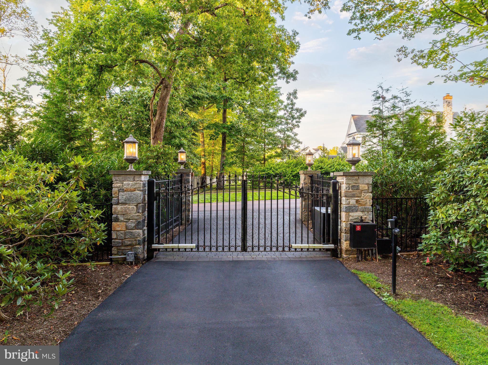 Originally known as Ederllyn and built in 1898, Second Tamora is a landmark Gwynedd Valley estate offering architectural permanence, privacy, and confidence rarely found today. Set on nearly 3.5 park-like acres behind a gated entrance, this storied stone manor reflects over a century of thoughtful stewardship—where history has been preserved and essential systems have been responsibly restored and modernized. A long, tree-lined drive leads to a circular courtyard with fountain and four-car garage, setting the tone for a residence designed for gracious living and entertaining. Inside, the home showcases timeless craftsmanship including a grand marble foyer, hand-painted architectural details, multiple staircases, substantial stone walls, and ten fireplaces—three of which are gas—each space offering scale without pretense. Importantly, the current ownership has invested significantly in the property’s infrastructure, addressing the elements that matter most in a historic estate. Electrical systems have been updated with knob-and-tube removed, two commercial-grade generators installed, extensive water management completed, patios and terraces reinforced, landscaping enhanced, and the outdoor pool and spa fully restored. These improvements provide peace of mind and allow the next owner to focus on personalization rather than remediation. The kitchen and baths are functional and ready for a future vision, offering a rare opportunity to tailor finishes without inheriting unfinished structural work. Additional features include a catering kitchen and expansive lower-level spaces suited for storage, fitness, or support use. Beyond the residence, the grounds provide a serene backdrop for outdoor living, private gatherings, or quiet reflection—just minutes from regional rail, major highways, and the conveniences of Montgomery County. The property lies within the award-winning Wissahickon School District and near an array of highly regarded private schools. Second Tamora has welcomed notable guests over its long history and now stands ready for its next steward. This is not a home for everyone—but for the buyer who values architectural integrity, infrastructure confidence, and the freedom to create something truly personal, it represents an exceptional and increasingly rare opportunity.
