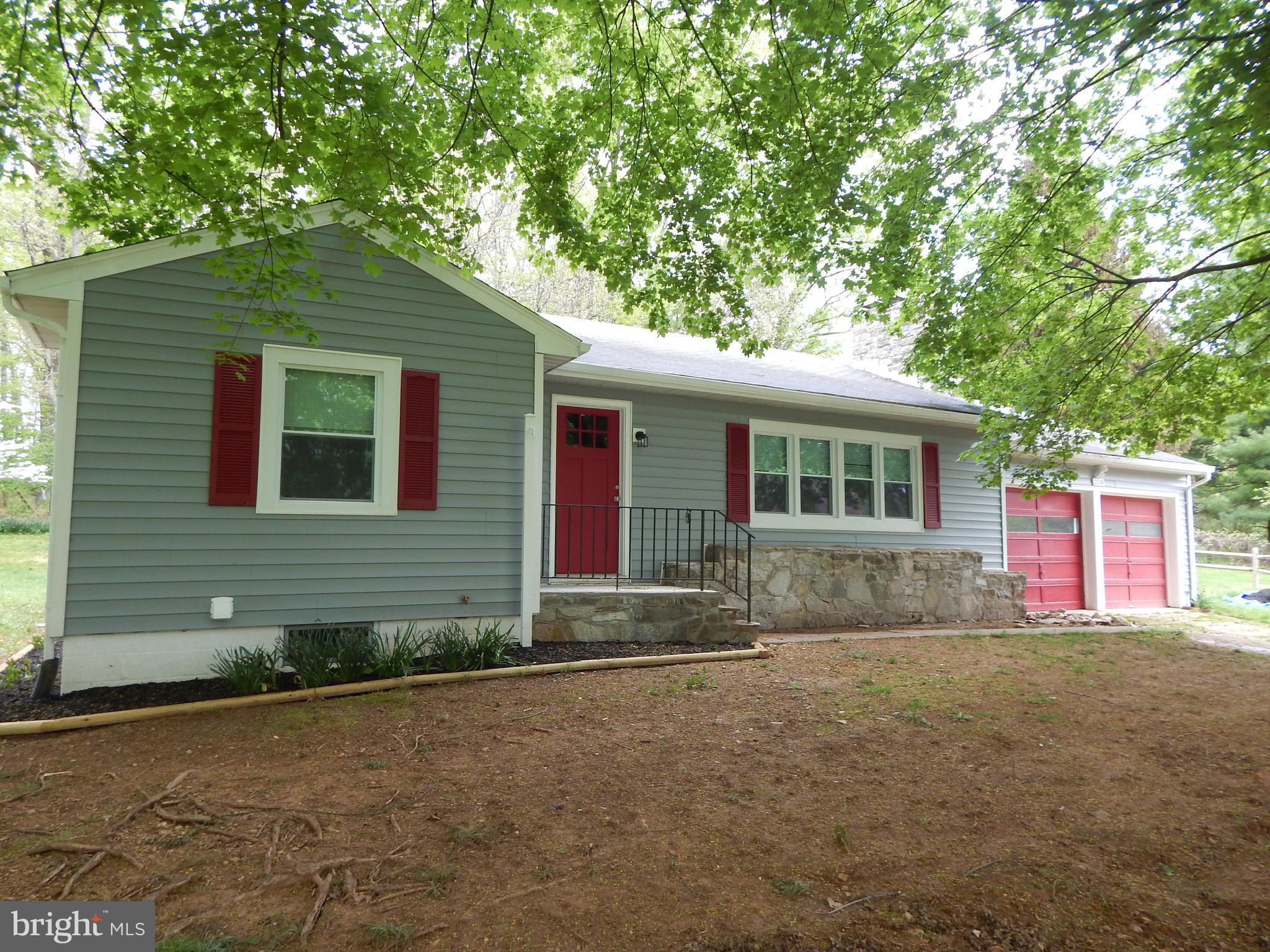 Beautifully Renovated 3 Bedroom 3 full bath home with finished basement and huge, sunroom addition with wood burning stove.  Refinished wood floors lead you to your brand new Kitchen with high-end appliances, granite counters and tons of cabinet space.   Beautiful ceramic tile bathrooms.   Master bedroom features adjoining bathroom and huge walk-in closet.  Ideal location.  Wonderfully landscaped.  Priced to sell, this home has it all.  Ask about seller help for closing costs and paving the entire driveway.