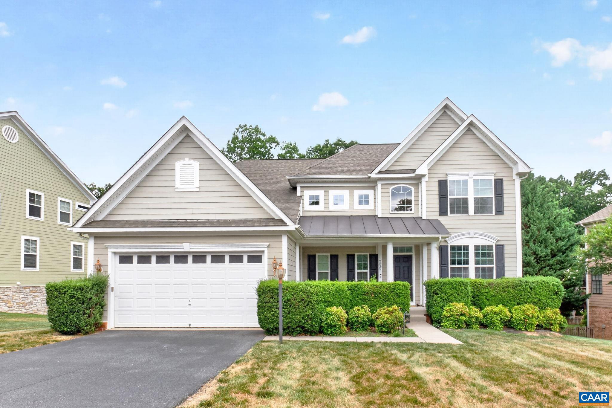 Fantastic new listing in a desirable Albemarle County neighborhood just minutes from NGIC, Hollymead Town Center, the airport, and Charlottesville! This spacious home offers a comfortable floorplan with generously sized rooms and a private fenced backyard. The large eat-in kitchen features granite countertops, wood cabinetry, hardwood floors, and abundant workspace. Main level boasts a dedicated home office with French doors, formal dining room, inviting great room with fireplace, and convenient 2-car garage. Upstairs, the spacious primary suite offers a walk-in closet and private bath with soaking tub and separate shower. Three additional bedrooms and a full bath complete the upper level. The partially finished terrace level provides excellent flexibility with rough-in plumbing for a future bath plus ample unfinished space for storage or additional finished square footage. Enjoy outdoor living on the large rear deck overlooking the private fenced backyard?perfect for entertaining, play, or relaxing at home. The Tesla Wall Connector was professionally installed in 2024 by a Tesla-certified electrician, ensuring compliance with Tesla?s installation standards and local electrical codes.,Granite Counter,Wood Cabinets