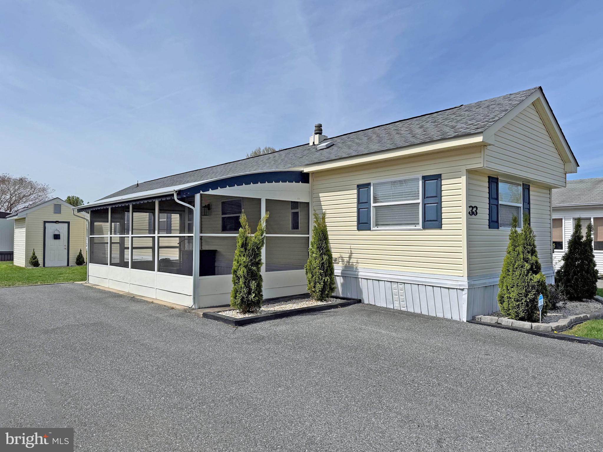 East is located in the "Midway" area of Rehoboth, so you'll be an equal distance - about 4 miles - to the Rehoboth boardwalk or the Lewes public beach! And there is a water park, movie theater, fitness center with racquetball, and restaurants just a short distance from the community. You can hop on the DART bus, too, to reach the beaches. Freshly painted and nicely updated! This 1981 Ritz Craft Fashion Craft-model home features a split bedroom plan, so it is like having two main suites. The living room opens to the spacious kitchen. The kitchen has a large, curved breakfast bar and space for a dinette set. There is also a built-in buffet in the dining area for your fancy dishes. Kitchen appliances include a smooth-top electric range, a range hood and a fridge (there’s a base cabinet next to the sink that could be fit a dishwasher, if you want to add one). The laundry area, with a full-size washer and dryer, is next to the kitchen. The main bedroom is to the rear of the home and it has a walk-in closet and is en Suite. That bath has a large garden tub/shower. The second full bath has a hall entry door and a private doorway from the second bedroom to give it that “en Suite” feeling. That bath has a standard tub/shower. The second bedroom has double closets, so there is plenty of storage space. Some newer sub-flooring & flooring. HVAC PAC unit (new Dec. 2025). Water heater is approx. 4 years old. Replacement windows. 10’x20’ SilverTop screened porch for great outdoor living space. Storage shed. Property is subject to a transferrable, annually-renewable leasehold interest: Lot Rent is approx. $958/mt. (renews annually with any increases capped as per 25 Del. C. Sec. 7050-7054). Lot rent includes membership to the outdoor pool. Trash/recycle and the State’s Relocation Trust Fund (RTF) are extra fees are added to the base lot rent. Buyer pays electric, water, sewer & metered gas (LP). A Park application is required, and a Buyer will be accepted as a Resident based on the following criteria: 1.)income verification, 2.)credit bureau score, plus evaluation of debt-to-income ratio, and 3.)criminal background check. (Note: Rentals are NOT permitted in this community - but friends & family may always visit.) Financing may be available to qualified borrowers from a few Lenders that specialize in installment/chattel loans for mobile/manufactured homes on leased land. Closing costs include a real estate transfer tax (3.75% DMV Doc Fee) & a Settlement Agent fee.