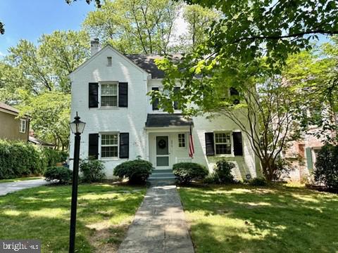 Lovely solid brick home with 4 finished levels sited on a gorgeous flat, fenced rear yard with detached garage and driveway parking.  Across the street from Western Grove Park and walking distance to Friendship Heights metro, shopping and restaurants.  The main level consists of the entry foyer with coat closet, large living room with doors to the rear screened porch, den/office with powder room, dining room and white galley kitchen.  Upstairs are 3 bedrooms and 2 full baths.  Fixed stairs from the hall lead to the finished attic (4th bedroom).  The lower level is partially finished with a recreation room, half bath, laundry and a large storage room.  No cats.  Pets on a case by case basis.  Available in early July for a 12 month rental.