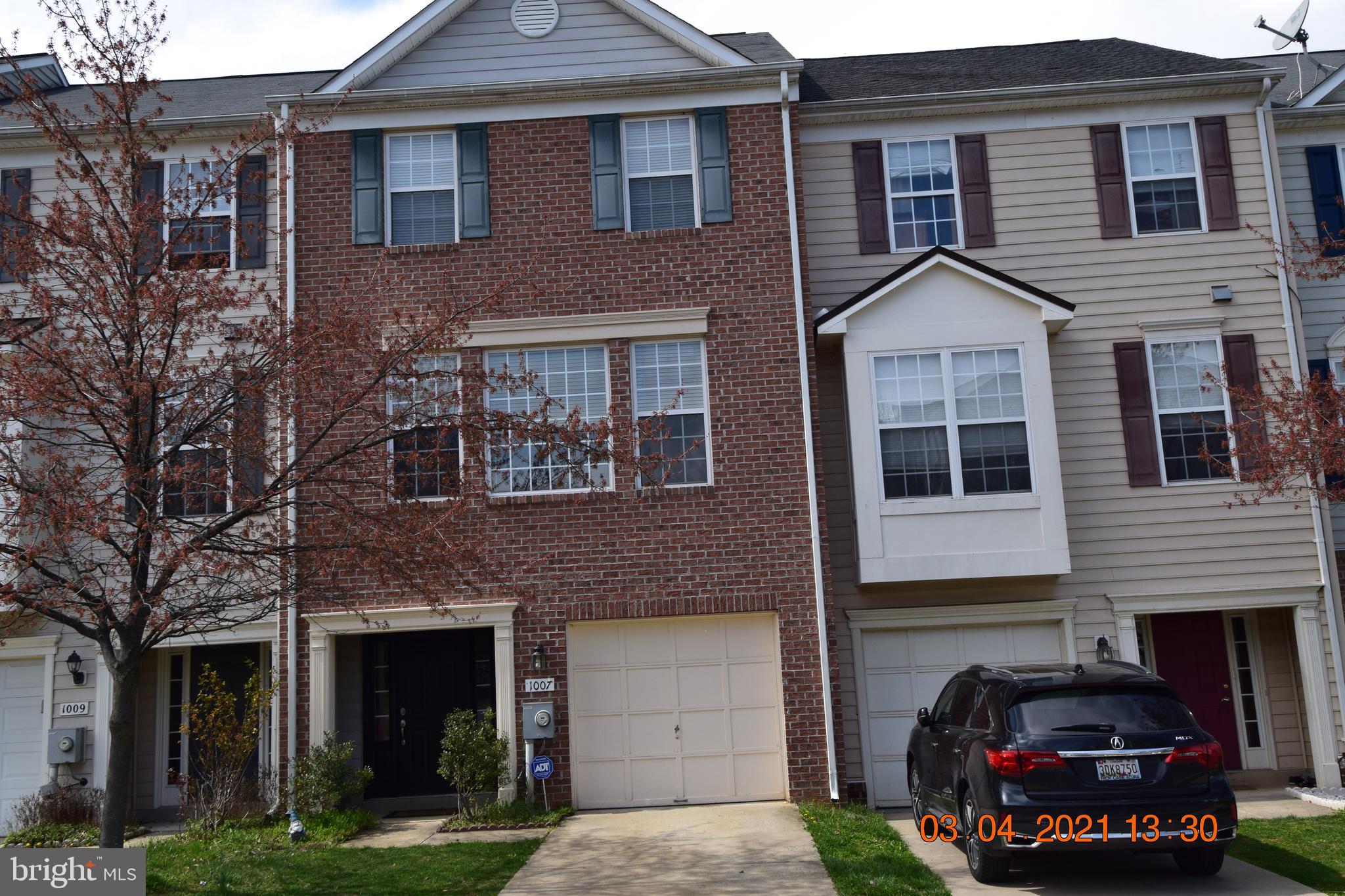 Beautifully maintained Town House, HVAC 2 years. Eat in Updated Kitchen,  Stainless Steel appliance with smart Refrigerator.  4 spacious Bedrooms with walk in Closets. Relaxing Deck off kitchen. Walk out Basement Br. Laundry on upper level. 1 car garage. Gas Fire Place in Livingroom.  Plenty of parking for guests on street.