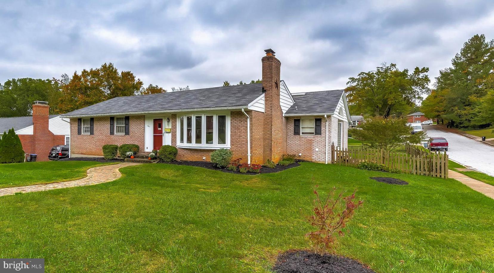 This rarely available, beautiful brick rancher is located in desirable Lutherville-Timonium and boasts a large addition with soaring ceilings. It's move-in ready and gorgeous, with gleaming hardwood floors and a cozy fireplace. 3300 finished square feet, 3 beds, 3 full baths, and a huge basement ensure that this home will have plenty of space for you and your family. It has been freshly painted and equipped with a washer and dryer on the first floor.  The fenced-in yard includes a large Trex deck and a brand new mechanical awning. The home also features a new roof, new HVAC system, and new water heater. Spend your holidays in this beautiful home which is perfect for entertaining. This gem will not last long!