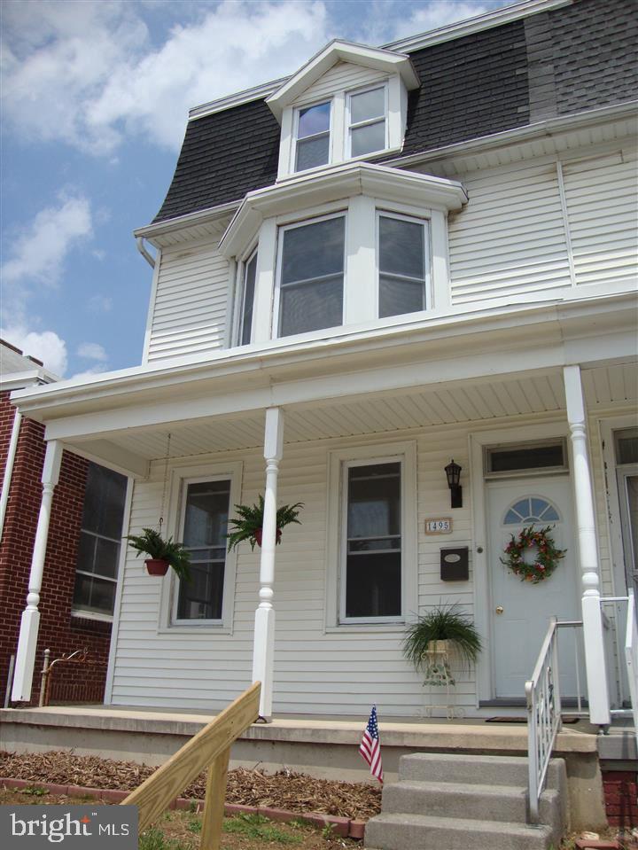 Great Value!  5 bedroom   1.5 bath   2 car garage   Townhouse that features over 2000 SF of living space   New carpeting   Refinished wood floors   New replacement windows   Freshly painted   All appliances including washer and dryer   And, a fenced-in yard with deck.