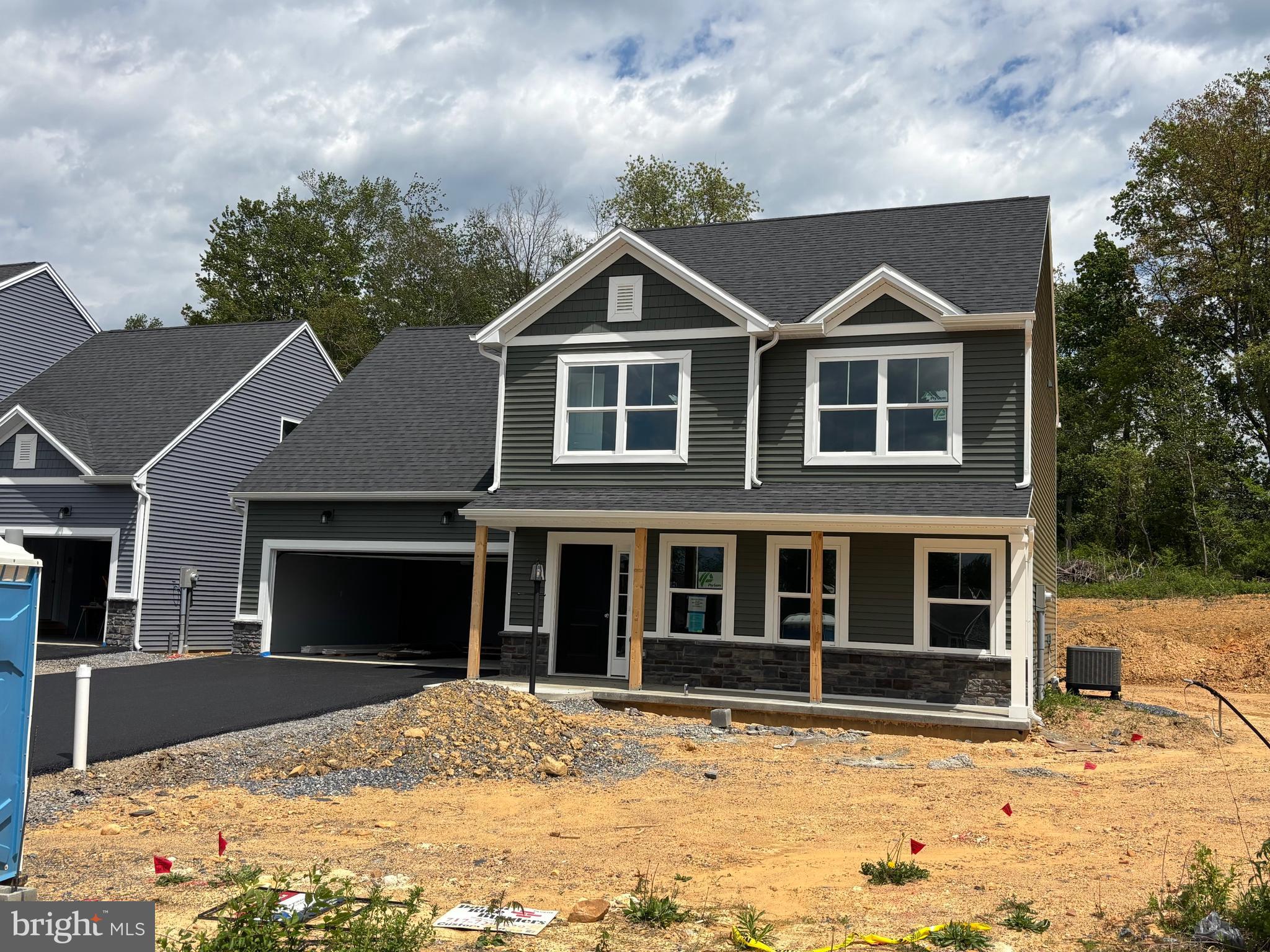 New Construction at Greene Acres. Covered front porch, spacious living room, open concept kitchen/dining, rear patio and half bath on main level.  Upper-level features four bedrooms including primary suite with attached primary bathroom, 2nd full bathroom and laundry area. Attached two-car garage.