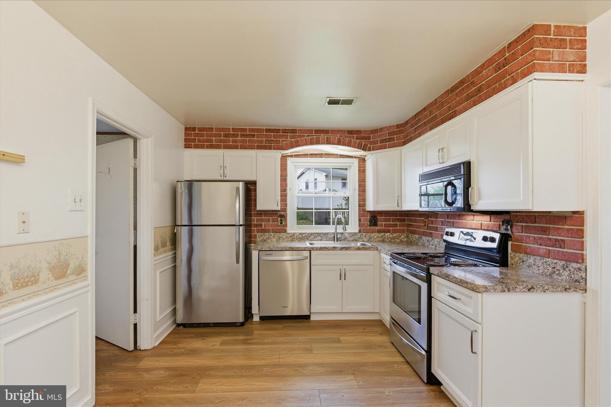 NEW PRICE! Spacious one-level living in Severn offering over 1,700 square feet, this 3-bedroom, 2-bath home features a flexible layout with a bright living room, a separate family room with fireplace, and an eat-in kitchen with updated cabinetry, granite countertops, and ample storage. Updates are already underway, providing a strong starting point for the next owner to complete and customize to their taste. The primary bedroom includes a private full bath, while two additional bedrooms offer versatile space for guests, a home office, or everyday living. Situated on a .28-acre lot, the property offers a generously sized backyard with room for outdoor enjoyment and future improvements. Driveway parking and a convenient location near shopping, dining, major commuter routes, Fort Meade, NSA, and BWI Airport add to the home’s overall appeal. With its combination of size, layout, and potential, this property presents a strong value opportunity in an established Severn community. Seller reserves the right to accept an offer at any time.