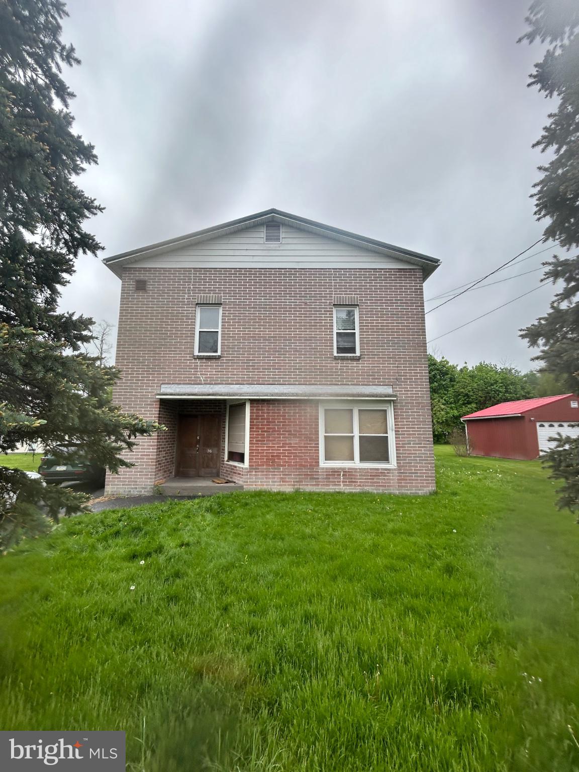 This traditional brick residence, built in 1940, presents a compelling investment opportunity with a total finished area of 3,600 square feet. Featuring four spacious bedrooms and two full bathrooms, this detached home is poised for both immediate rental income and long-term appreciation. The property sits on a generous 0.24-acre lot, providing ample outdoor space and potential for future enhancements. Investors will appreciate the attached garage and driveway parking, ensuring convenience for tenants. The absence of a homeowners association allows for greater flexibility in property management and rental strategies. With a solid foundation and classic architectural style, this property is primed for modernization, which can significantly increase its market value. Located in a stable market, this residence offers the potential for strong rental yields and capital growth. Seize the opportunity to enhance your portfolio with this versatile investment that combines charm, space, and strategic potential.