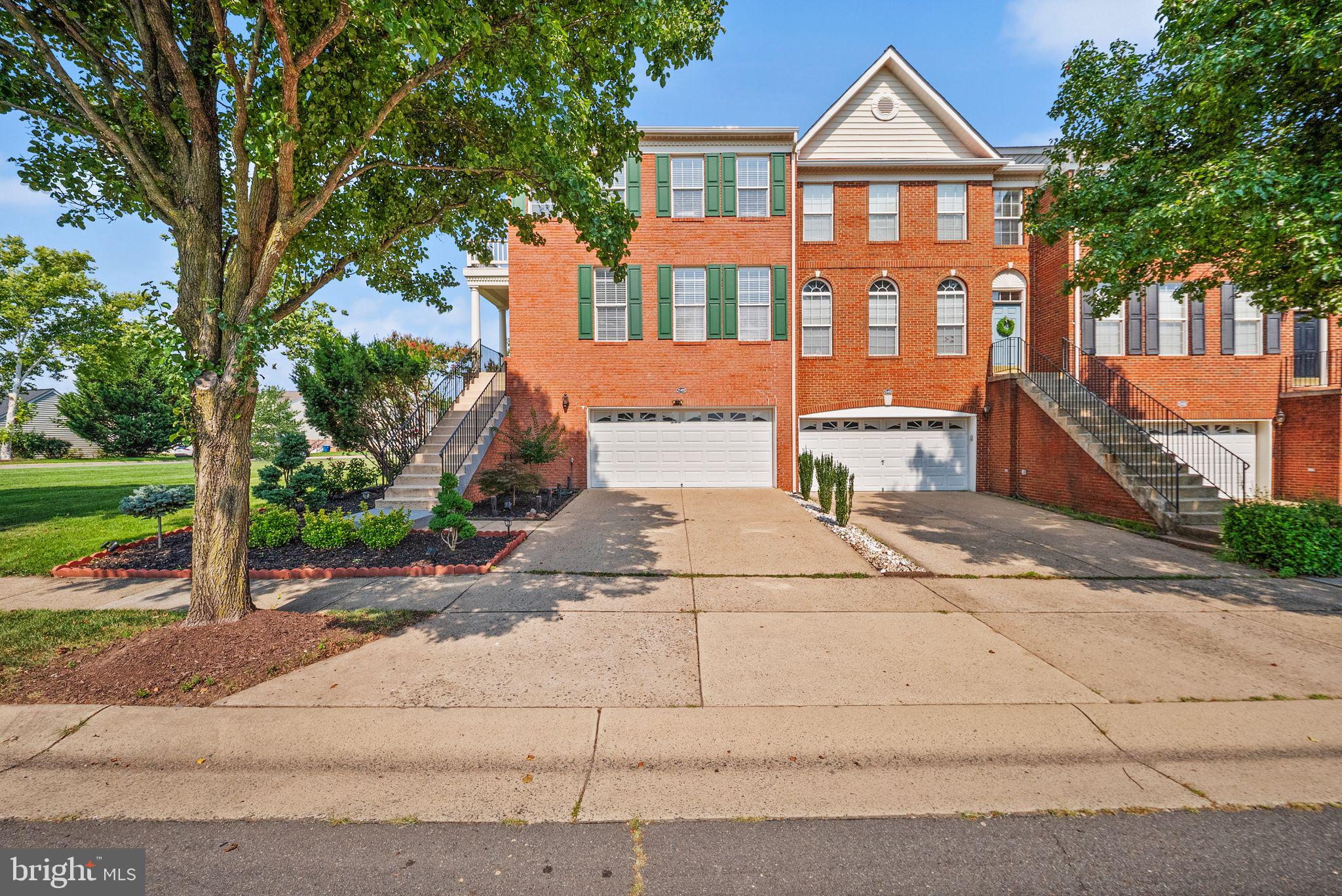 Experience South Riding living at its finest in this beautifully updated end-unit townhome. Offering space, style, and an unbeatable location, this is the one you’ve been waiting for. Main Level: The heart of the home features a formal living room with new luxury vinyl plank flooring that flows into the dining area. The gourmet kitchen is equipped with brand new KitchenAid appliances (2025), a new granite countertop and backsplash, a breakfast bar, and table space. A convenient powder room completes the main level. spacious 2-car garage with ample storage. Step onto your private deck—newly stained in 2024—and overlook one of the largest yards in South Riding, perfect for entertaining. Upper Level: Retreat to the generous primary suite, complete with a spa-like bath featuring a soaking tub, separate shower, and two walk-in closets. Two additional bedrooms, a full hall bath, and an upper-level laundry area provide comfort and convenience. Lower Level: The finished basement offers expansive recreation space and a wet bar, ideal for movie nights or hosting gatherings.
Recent Updates Include: 2025: Fresh professional paint throughout; new carpet; new air handler unit for the upper level; upgraded kitchen with new granite countertops/backsplash and brand-new KitchenAid appliances (cooktop, dishwasher, microwave/oven). 2025: Professional landscaping with beautiful evergreen plants; new luxury vinyl plank flooring in living/dining rooms; deck and fence stained; epoxy garage floor coating. 2022: New roof.
Located in top-rated South Riding with 4 pools, a splash park, tennis courts, trails, and more—all with a low HOA fee! You’re just 0.1 miles from the elementary school and 0.2 miles from a community pool. Easy access to Routes 50, 28, 29, and I-66.