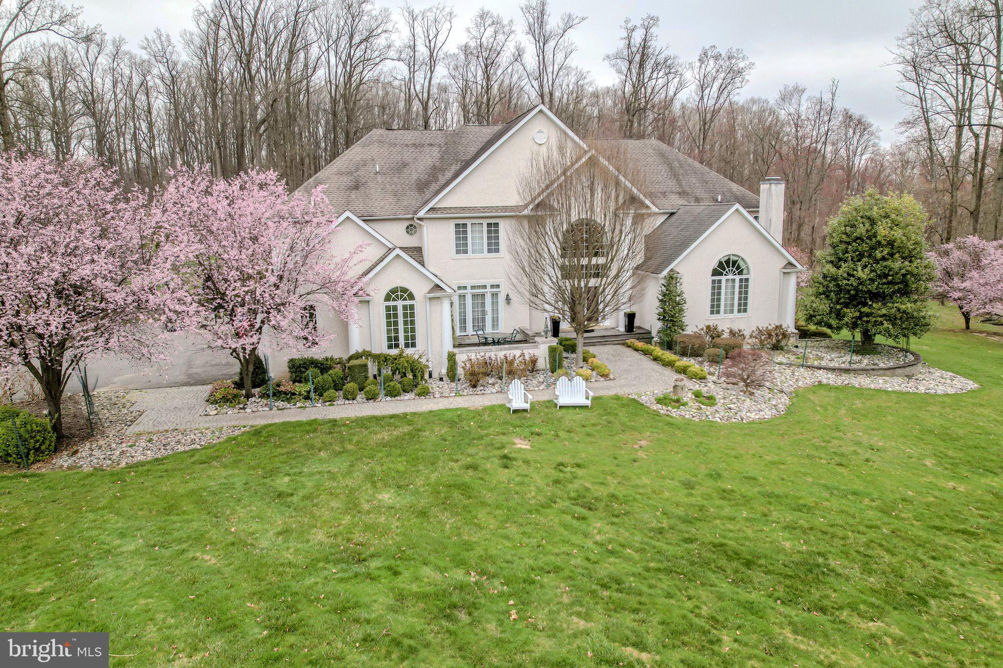 Wonderful, stately home on 2 acres in Glenn Mills on a quiet cul-de-sac.  This grand home features a rolling lawn and inground pool with loads of hardscape and pastoral views.  The vast and lavish interior of this home features open and airy entertaining spaces, two storey fieldstone fireplace, gourmet eat-in kitchen with large island and stainless appliances, 2nd floor overlook to the grand family room, den with richly appointed built-in cabinets and bookshelves, a first floor primary bedroom suite with separate sitting room, luxury bath and acres of closet space, and the list goes on and on.  Upstairs features 5 additional bedrooms, including a junior primary bedroom with ensuite bathroom.  The lower level features a second kitchen, fully outfitted beauty salon,  home gym, game room, billiard room and lots of storage.  The basement features a full walkout to the pool deck as well.  This wonderful home must be seen to be truly appreciated.