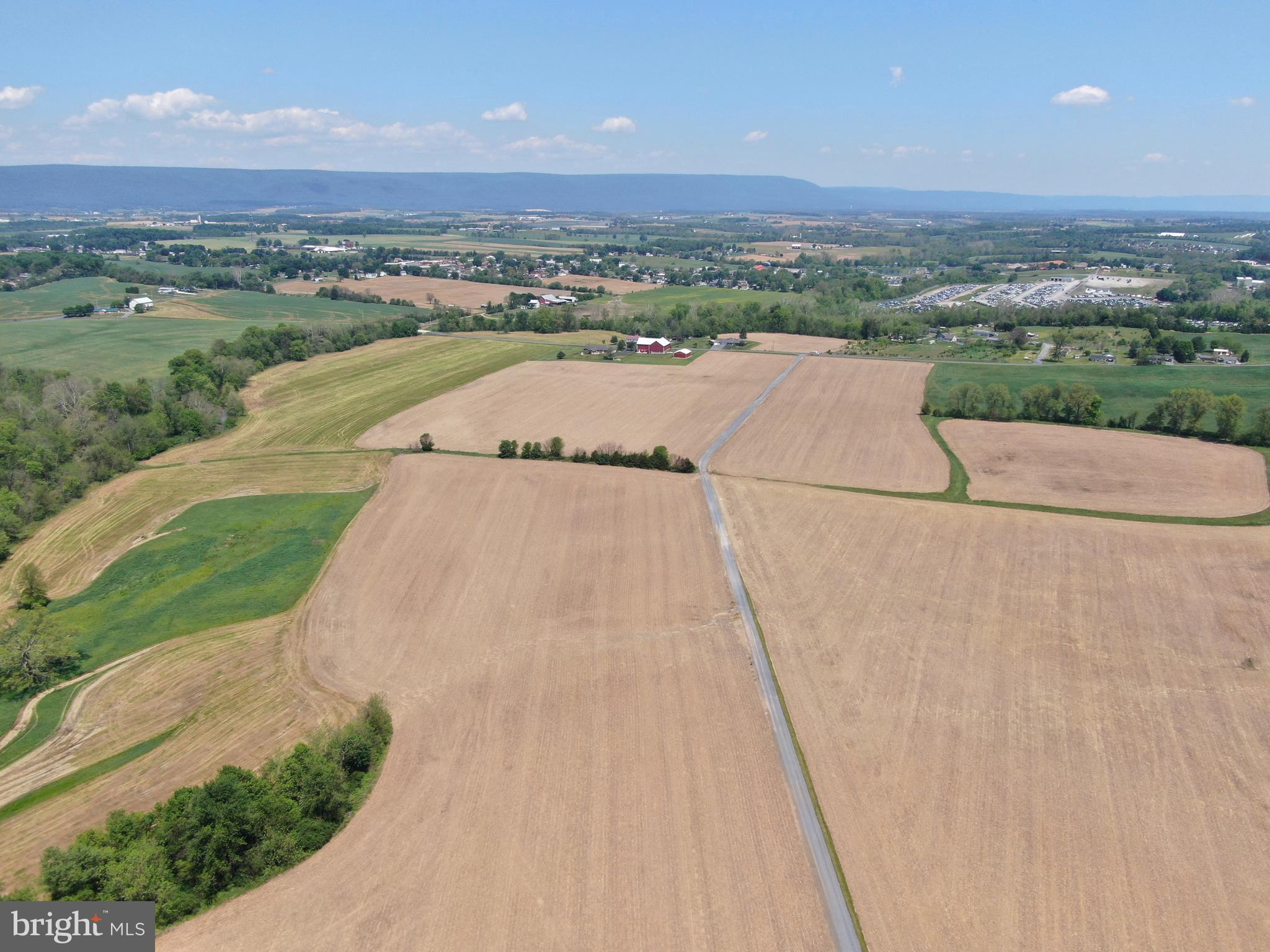 EXCELLENT 106± ACRE FARM IN FRANKLIN COUNTY, PA! This outstanding farm features beautiful, level land with large open fields and approximately 96± tillable acres, making it ideal for a wide variety of agricultural uses. With road frontage along Leafmore Road and over 3,000 feet of frontage on Back Creek, the property offers both excellent accessibility and scenic natural beauty. Great for crop farming, produce farming, livestock, horses, and more, this exceptional property offers endless possibilities. It would also make an outstanding homesite with breathtaking views of the surrounding countryside. Conveniently located near Chambersburg, St. Thomas, Rt. 30, I-81, and more, this is a rare opportunity to own a prime piece of Franklin County farmland. The tillable land is currently under an active lease through December 1, 2026. The farmer retains the right to harvest all planted crops.

This property will be offered at auction on Thursday, July 23, 2026, at 3:00 PM. The list price in no way represents a minimum, starting, or acceptable bid.

This property will be offered in a multi-parcel auction, giving buyers the flexibility to purchase Tract 1, Tract 2, or both tracts. Tract 1: Rancher and Outbuildings on 3+/- Acres, Tract 2: 106.19+/- acres with approx. 96 acres tillable.

Taxes for the entire property are $9,087; taxes may be reassessed dependent on how the property is sold.