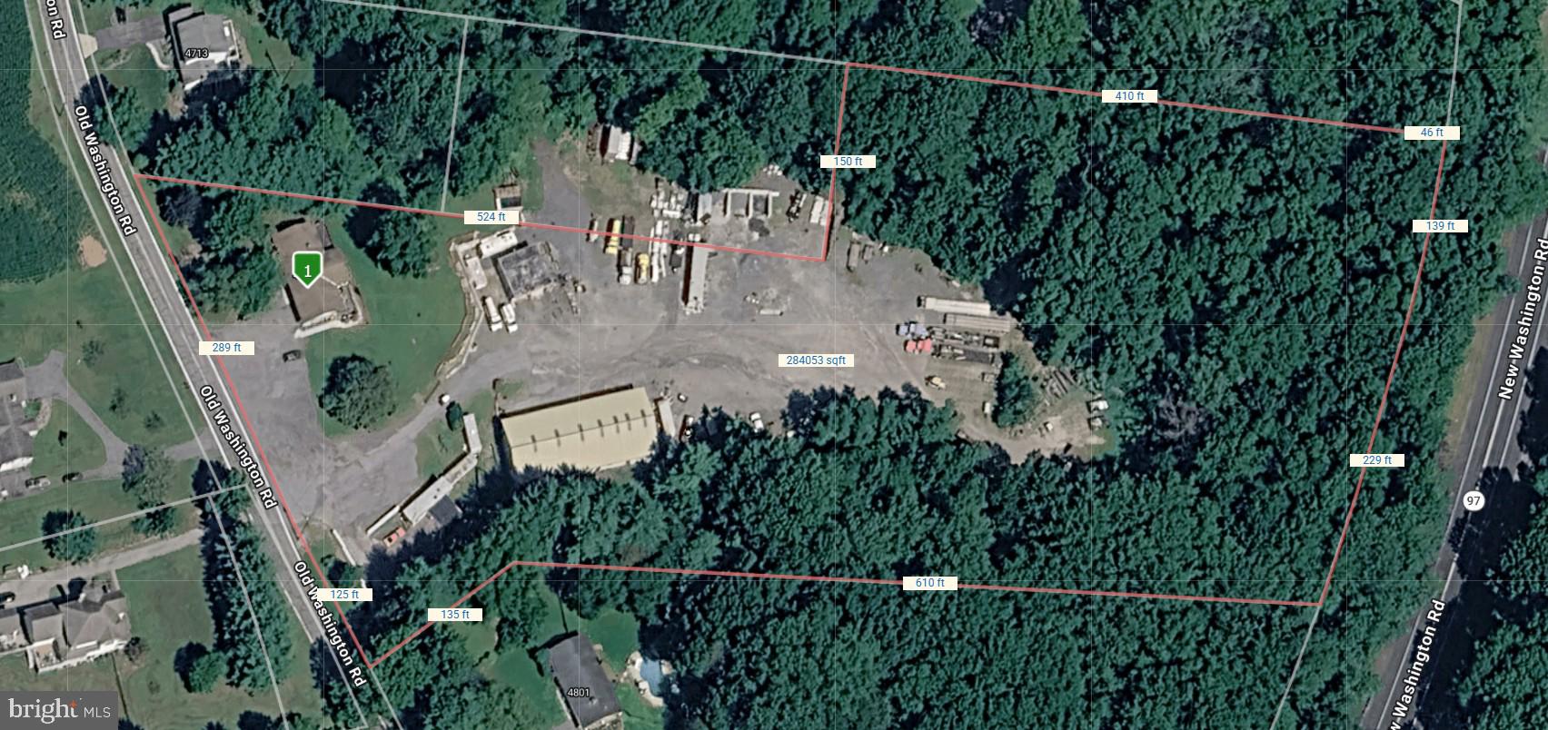 Prime 6.71-Acre With Zoning Approval for Contractor Storage Yard. Price Includes Additional 1-Acre Building Parcel – Exceptional Storage, Operations & Expansion Opportunity. Includes a residential dwelling with fully finished basement In-Law Suite. 

Rare opportunity to acquire a well-established contractor storage yard and operations facility situated on 6.71 acres, plus an additional 1-acre parcel, offering ample space for equipment storage, fleet parking, material staging, and future expansion. The property features a large gravel yard with extensive open storage areas, multiple access points, and excellent maneuverability for heavy equipment, trucks, and trailers. 

Improvements include an office building for administrative operations, a large 105' x 47' 5 Bay Garage/Shop building with overhead doors suitable for equipment maintenance and storage, and additional structures that support a variety of commercial uses. An additional 30' x 30' 2 Bay Building. The expansive yard has been utilized for contractor operations and provides a functional layout for construction companies, utility contractors, landscapers, excavation firms, transportation businesses, and similar users.

The wooded perimeter offers privacy and screening while preserving significant land area for future development or expansion. With substantial frontage and visibility, this property presents a unique owner-user or investment opportunity in a highly versatile setting.

Property Highlights:

6.71-acre main parcel plus additional 1-acre parcel
Established contractor storage and equipment yard
Large gravel parking and staging areas
Office building and maintenance/shop facilities
Ideal for construction, landscaping, excavation, utility, or fleet operations
Ample room for trucks, trailers, equipment, and material storage
Expansion potential and flexible commercial use possibilities
Convenient access to major transportation routes

A hard-to-find combination of acreage, existing infrastructure, and operational functionality, ready for continued commercial use or redevelopment to meet your business needs.