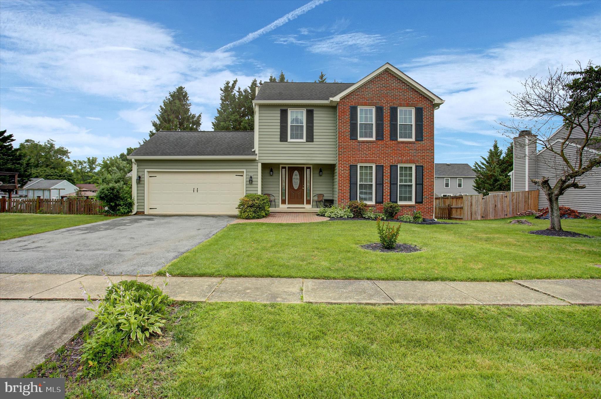 Prime location in Glade Manor! Nestled in the heart of Walkersville, this home offers unbeatable proximity to highly rated Walkersville schools and the beautiful Heritage Farm Park. This stunning property perfectly blends major structural peace-of-mind with beautiful modern upgrades. Boasting incredible curb appeal, the exterior shines with brand-new siding, windows, gutters, and downspouts, complemented by a solid 6-year-old roof. Inside, the home features fresh flooring throughout and a beautifully updated kitchen complete with premium granite countertops and stainless steel appliances. The flexible floor plan offers 4 Bedrooms, 3.5 baths and a fully finished basement with an in law suite (possible rental income as the basement has an outdoor entrance), or also perfect for a home gym or media room. Step outside to your private outdoor oasis with new exterior lighting, featuring a 5-year-old deck and patio overlooking a generous .25 acre lot.  Complete with an attached garage, this home is move-in ready.  Walk or bike to local sports fields, paved trails, and a premier playground, all while enjoying a peaceful, established community! Don't miss this location-perfect gem!