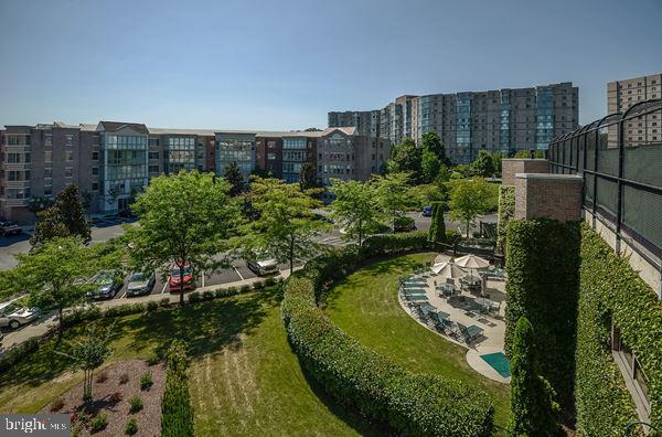 Welcome to this elegant and lovingly cared for condo at Lansdowne Woods! This freshly painted 2 bedroom, 2 full bathrooms has lovely new LVP floors in the kitchen. This unit offers a spacious foyer with dual closets, bright and sunny living room, dining area, sunroom with glass enclosure accessible from both bedrooms and living room. An owners' bedroom with en suite bathroom (with new flooring) and two closets (one walk-in).   The second bathroom has tub/shower and new flooring and new raised toilet.  New furnace in 2022.  In unit laundry. Storage unit included.  CONDO FEES INCLUDE water, sewer, cable TV, internet, HVAC maintenance, etc.  Enjoy all of the Lansdowne Woods amenities to include scenic walking trails, an indoor pool, restaurant, fitness center, tennis courts, 24-hour security, community activities and more. Close to Route 7, Inova Loudoun Hospital, One Loudoun, shopping, restaurants, and entertainment.