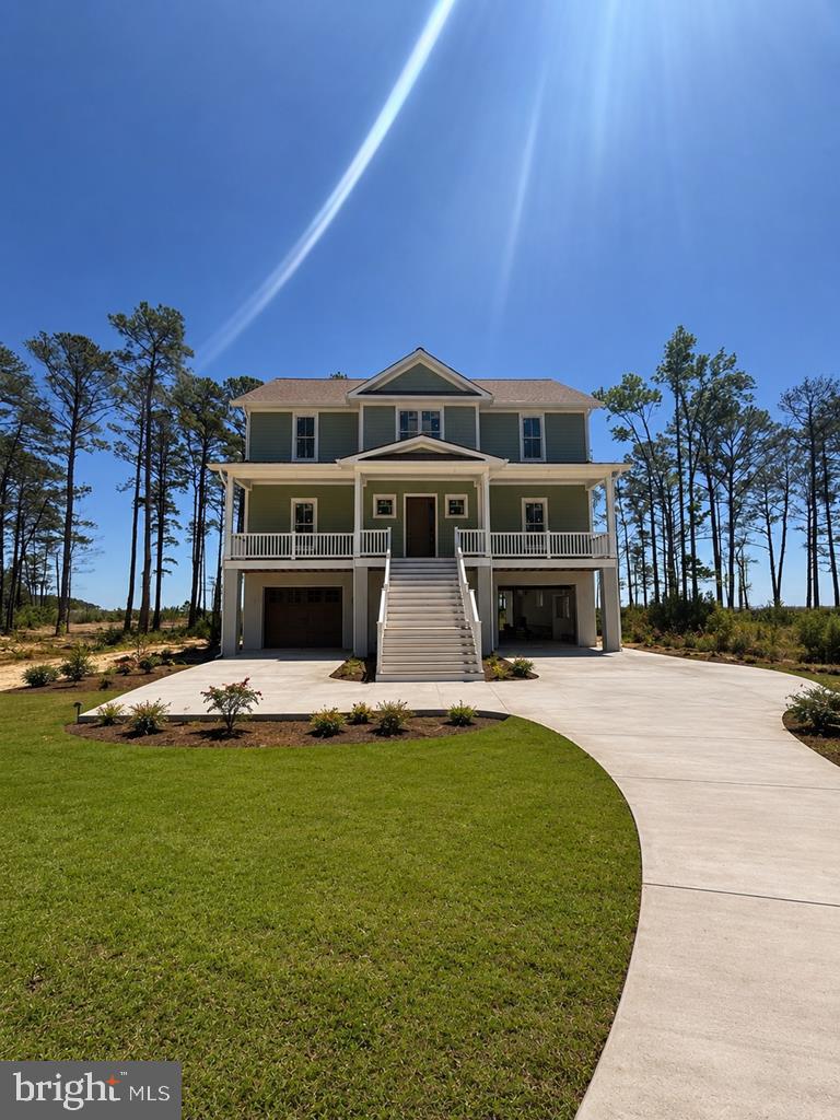 Experience exceptional waterfront living in this brand-new custom home, scheduled for completion by the end of July 2026. Perfectly positioned on 2.38 acres with 239 feet of shoreline, this three-story residence captures breathtaking panoramic views of Barnes Creek and the Chesapeake Bay from nearly every level. Designed for both luxury and convenience, the home features 3,486 square feet of thoughtfully designed living space, plus an additional 1,743 square feet on the ground level, including the garage. An elevator provides easy access to all three floors, making the home ideal for everyday living and entertaining alike. The spacious floor plan offers four bedrooms, three full bathrooms, and one-half bath, blending elegant finishes with modern coastal design. Expansive windows and outdoor living spaces maximize the stunning waterfront setting, creating a seamless connection between the interior and the natural beauty beyond. Whether you're seeking a full-time residence or a premier waterfront retreat, this exceptional new construction offers the rare opportunity to own a custom home with spectacular views, generous acreage, and direct access to the waters of Barnes Creek and the Chesapeake Bay. More pictures to come!