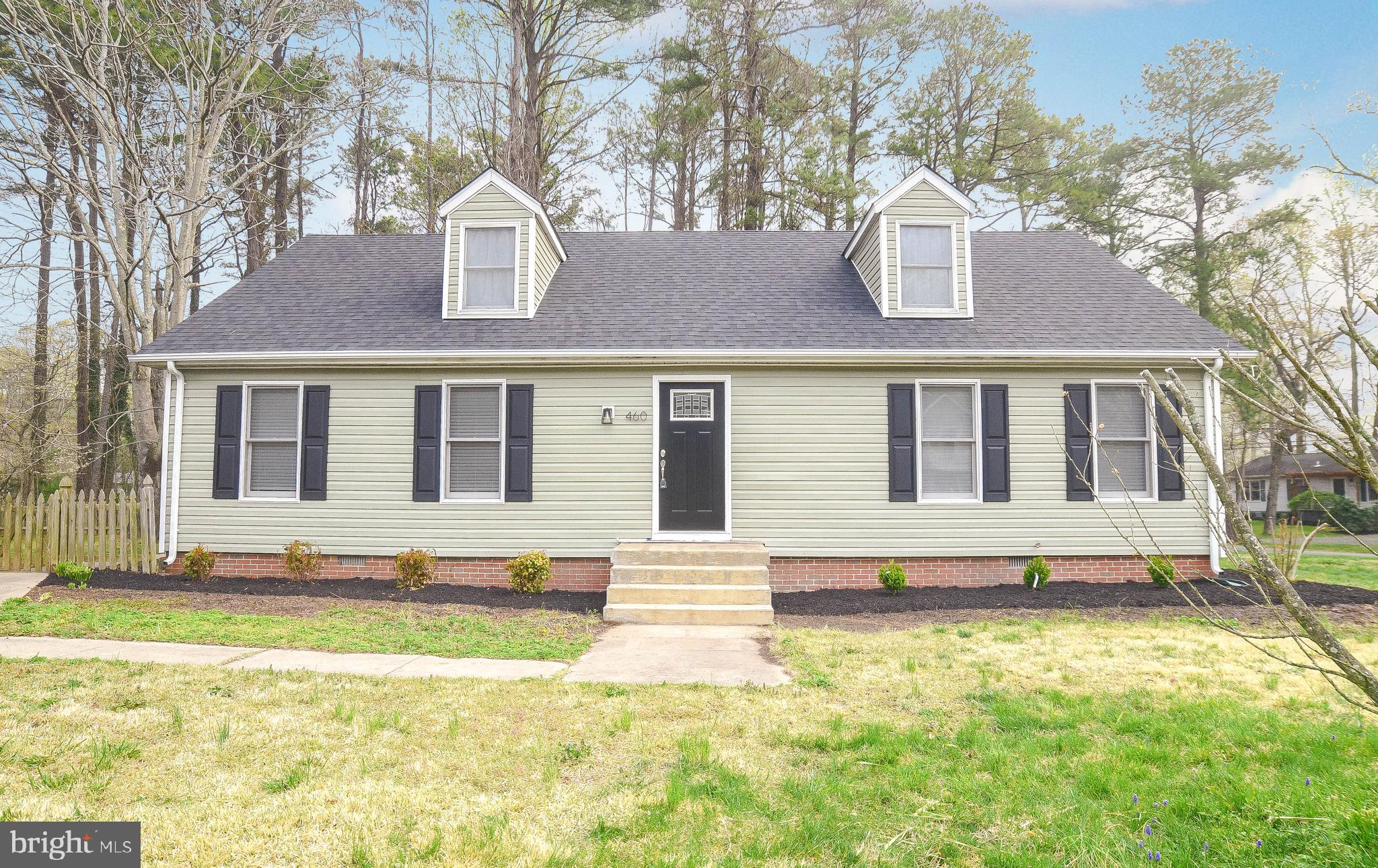 Great Cape Cod on a double corner lot in Drum Point.  So many updates prior to listing. New HVAC March 2021  ,New roof and gutters April 2021, all new appliances  April 2021, New front door, new lighting in some rooms, new carpet throughout, new siding in last 4 years.  Two main level bedrooms, and full bath plus two upper level bedrooms with hall bath.  Kitchen is large with plenty of space for dining table.  Front living room with new carpet.  sunroom on rear of house opens to large fenced yard.  Fresh paint throughout. Water access community