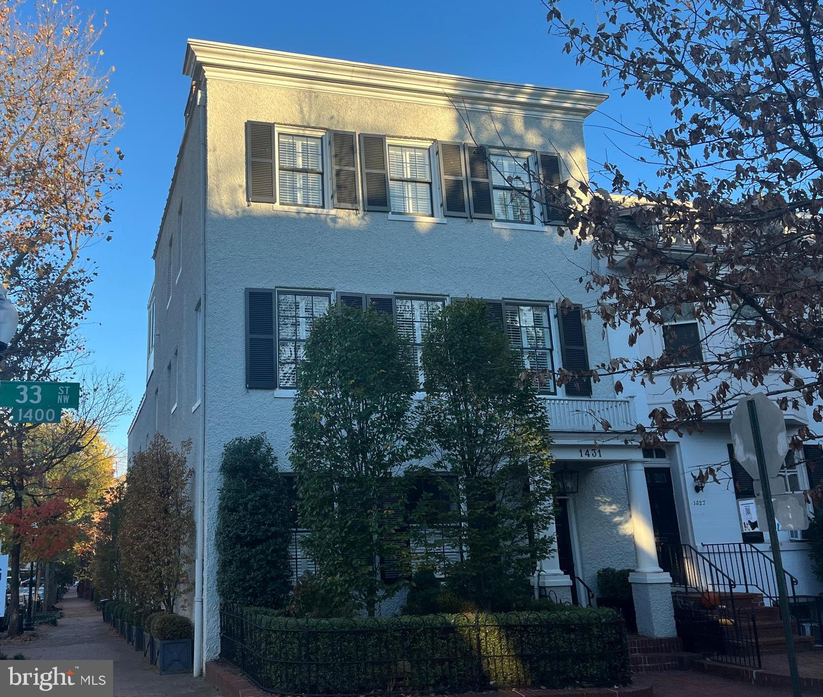 Beautifully renovated Georgetown home offers high quality, modern finishes, an elevator and a One Car Garage. The main level features a Foyer with herringbone hardwood floors, Living Room with marble wood-burning/gas fireplace, Formal Dining Room, Powder Room, Family Room with shiplap walls and access to an outdoor patio, Kitchen with large center island, stainless steel Wolf appliances, Subzero refrigerator, wine cooler, and Waterworks fixtures. The second level features the spacious Master Bedroom with his and hers closets, Master Bathroom with marble tiling, soaking tub, and Waterworks fixtures. Two additional bedrooms with en-suite bathrooms and walk-in closets complete this level. The top floor offers two bedrooms with en-suite baths, Wet Bar, and spectacular Roof Deck with views of Georgetown. The lower level has 1 Bedroom and full bath, Recreation Room, and Laundry Room. This home also includes an elevator that serves all four stories and a Garage.