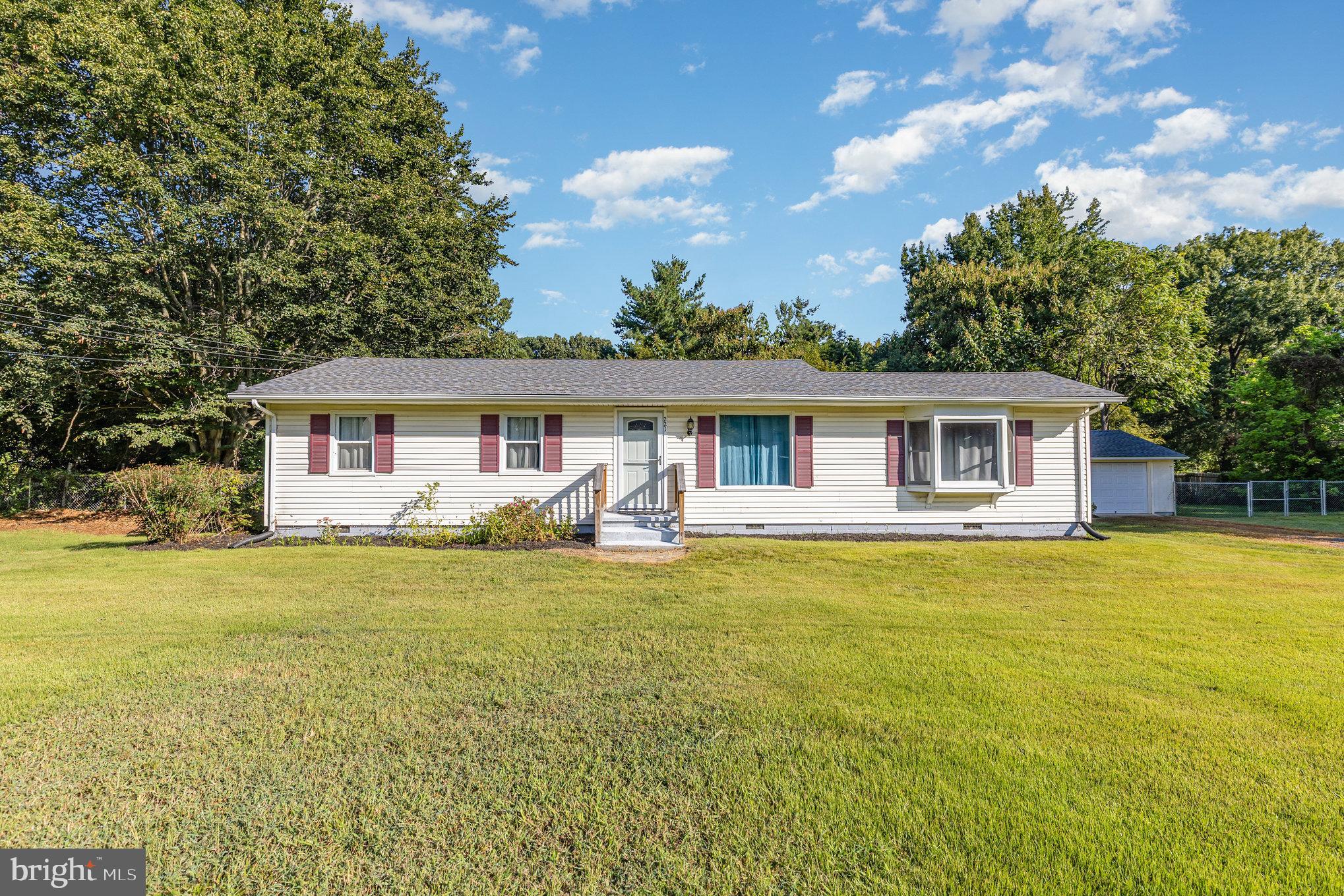 This property offers one of the best values in Placid Bay Estates, sitting on three separate lots totaling approximately $105,000 IN LAND VALUE ALONE!  Even better, Lot 12 may be buildable or sold separately, providing excellent flexibility and investment potential.
The beautifully updated 3-bedroom, 2-bath home was renovated just 4 years ago and features a modern kitchen with stainless steel appliances and a waterfall edge countertop. The spacious primary suite includes an updated bathroom, double sinks, and a large walk-in shower. A detached 1-car garage with a workshop, a fenced backyard, and newer shingles on both the home and garage complete this move-in-ready  property. MOTIVATED SELLER!
